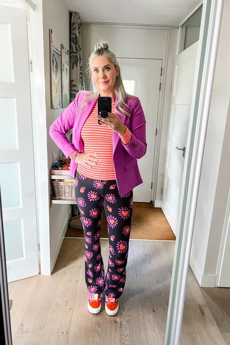 Ootd - Thursday. Flared legging with purple and orange hearts (Ambika), pink and orange striped top (old, Pieces) and a purple blazer (M&S Mode, ly), pink and orange Vans. 

#LTKmidsize #LTKstyletip #LTKeurope
