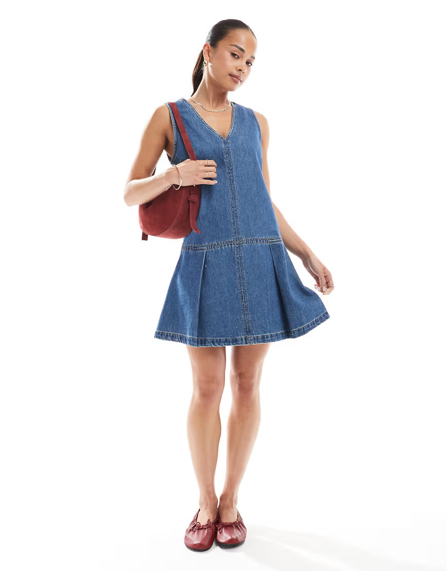 ASOS DESIGN denim sleeveless mini dress with pleated drop waist in midwash blue | ASOS (Global)
