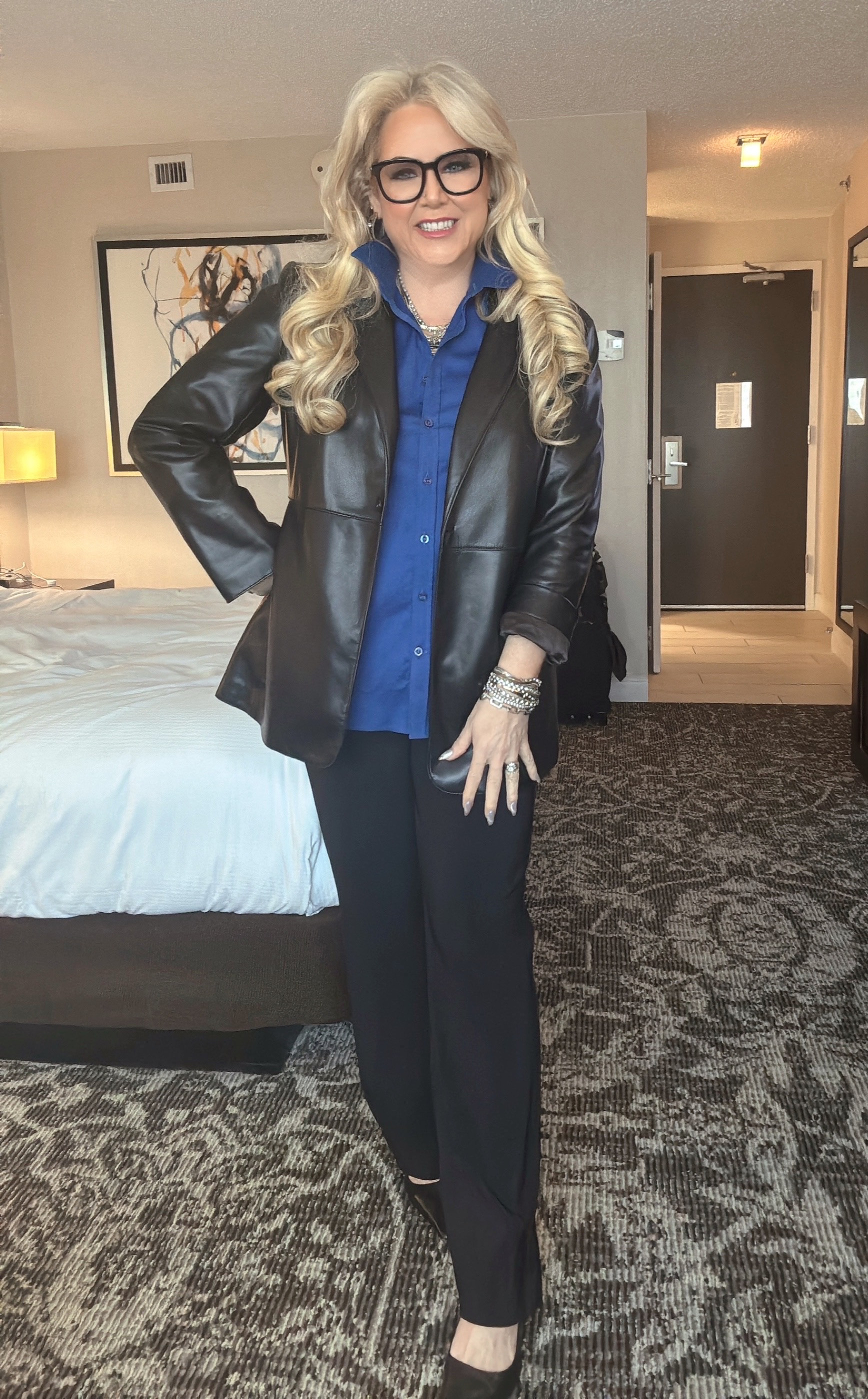 Traveling for work? ✈️ My go-to conference look is all about style AND practicality! This full leather blazer (L) is my ultimate staple – it doesn’t wrinkle, always looks sharp, and is perfect for those long travel days. The one I am wearing is OOS at Chico's, but  I have linked other quality blazers that would work. Paired with my travel-ready black POINTE pants and chic Sam Edelman kitten heels; I’m conference-ready without sacrificing comfort or style! #TravelInStyle #ConferenceOutfit #EffortlessChic #LeatherBlazerLove #LTKWorkwear #LTKTravel 

 #LTKOver40 #LTKWorkwear #LTKTravel
