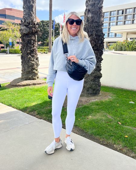 Love these white leggings and gray cropped hoodie, which are both 30% off at the alo yoga sale right now. Also linked my new balances and Crossbody bag. Size small 7/8 length in the leggings and small in the hoodie. Normal size 8 sneakers.

#LTKsalealert #LTKActive #LTKSeasonal