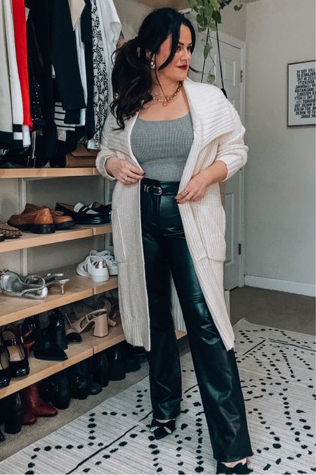 Express midsize holiday party outfit everything 50% off wearing an xl in the cardigan - xl bodysuit and size 14 in faux leather pants 



#LTKmidsize #LTKHoliday #LTKCyberWeek