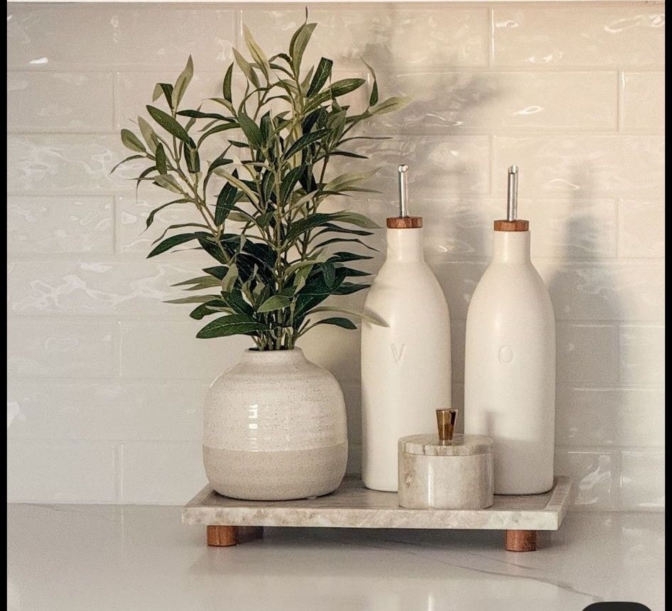 Recreate the Look  - Pinterest Inspo - the cutest little kitchen setup 🖤 

An easy way to elevate a small space - Linking the exact links and look alikes to help you recreate this look! 🌿




#target home
#target finds
#target kitchen  
#magnolia table 
#catch all tray
#kitchen tray 
#marble salt cellar
#essential oil diffuser 
#ceramic oil dispenser 
#kitchen counter styling 
#easy decor
#home decor 
#kitchen decor
#home organization 
#kitchen organization 
#kitchen aesthetic 
#modern organic decor
#kitchen styling
#affordable home styling
#affordable home decor 
#footed wood tray
#marble pedestal tray 
#kitchen decorating 
#olive oil containers
#olive oil dispenser
#faux plant
#faux Olive plant 
#LTKFindsUnder50 

#LTKfoodie #LTKHome