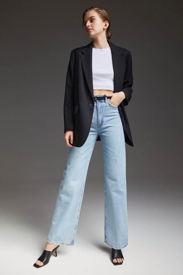 Slightly looser-fit, 5-pocket jeans in washed cotton denim with distressed details. High waist an... | H&M (US + CA)