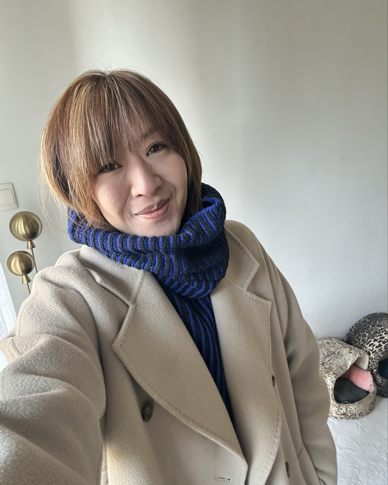 Navy turtlenecks offer a cozy base that pairs seamlessly with camel coats, creating a timeless winter silhouette seen in royal styles. The long camel coat adds warmth and elegance, draping beautifully for both casual errands and elevated outings. Complete the look with the Prada black leather long wallet, a practical bi-fold essential measuring about 19.5 cm wide for cards and notes.

Styling Tips
•	Layer over wide-leg trousers or jeans for balance, as in classic navy-camel combos. 


Shop these winter Friday vibes!
•	Navy turtleneck (link your fave)
•	Camel long coat (timeless neutral)[wearsmymoney]
•	Prada black long wallet  #LTKSeasonal #LTKfashion[jolicloset]
#WinterOOTD #NavyCamel #PradaWallet #FridayStyle #QuietLuxury

#LTKwinter #LTKasia #LTKstyletip