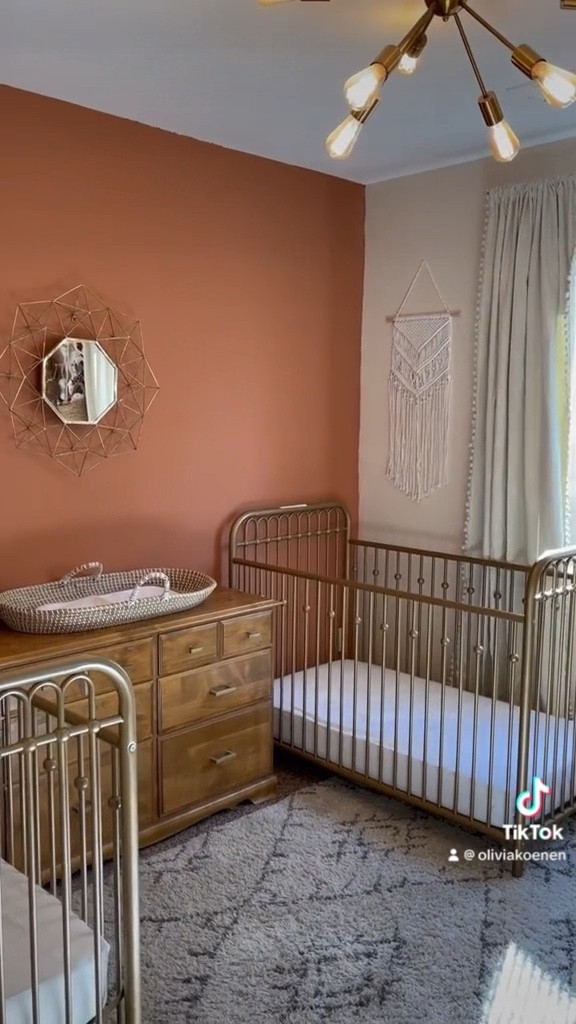 Shared nursery toddler room 🧡 everyone has been loving this on TikTok so finally linking Lucy and Ollie’s room. The dresser and mirror were resale finds and I switched out the hardware 

#LTKbaby #LTKbump #LTKhome