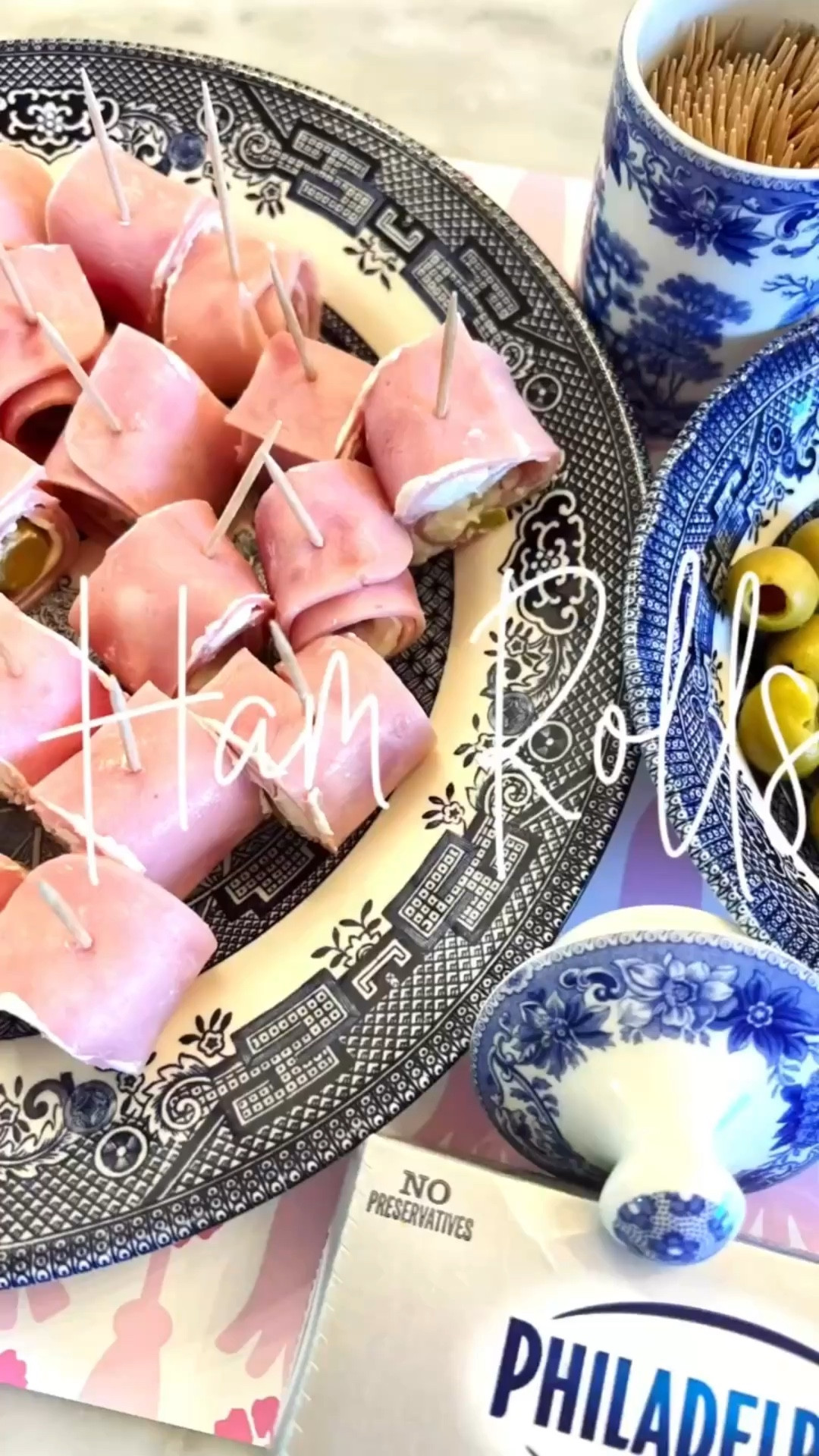 Sharing a hosting favorite! These ham rolls are so easy and great for bridal and baby showers or spring luncheons. 

1 lb. sliced cooked ham 
1 8 oz. block cream cheese 
Drained green olives

Spread cream cheese onto ham slices, add olives, then roll. Insert toothpicks to keep together