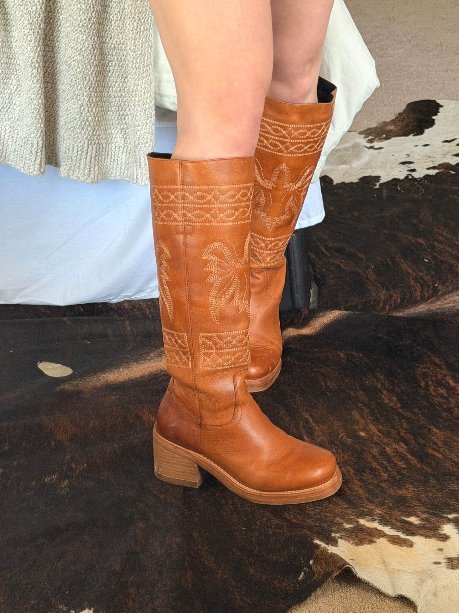 LOVING these boots so much! They are a perfect little marriage of a western cowgirl boot and the modern round toe / square toe knee high boots. The stitching is so detailed and you can never go wrong with a camel colored boot, dress them up or down

I’m a short girlie at 5’3” and I love the heel these have. 

Wearing my true to size and the color is TAN

Leather boots | brown boots | cowboy boots | knee high boots #LTKShoeCrush #LTKAmazonFinds #LTKWesternFashion 

#LTKFestival
