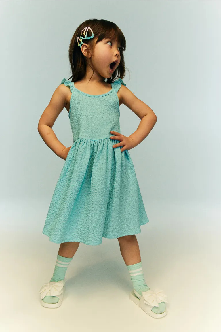 Flounce-trimmed jersey dress | H&M (UK, MY, IN, SG, PH, TW, HK)