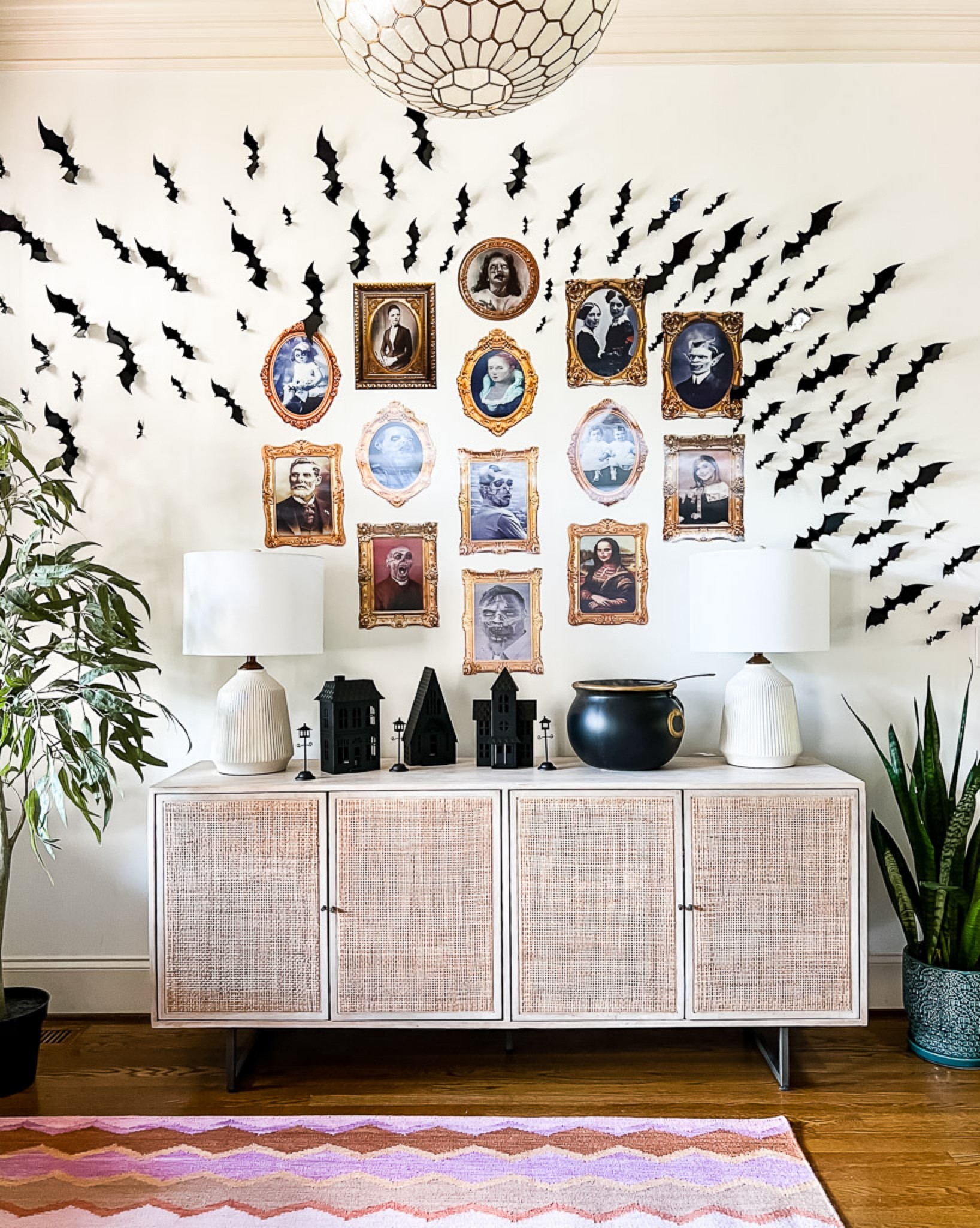 Halloween decor, Halloween decorations, 3-D Halloween portraits, cane Console table, faux olive tree, Serena and Lily capiz pendant light, dash and Albert, Annie Selke rug, 3-D bats, cauldron, Halloween houses, Halloween 2022 

#LTKSeasonal #LTKhome #LTKHalloween