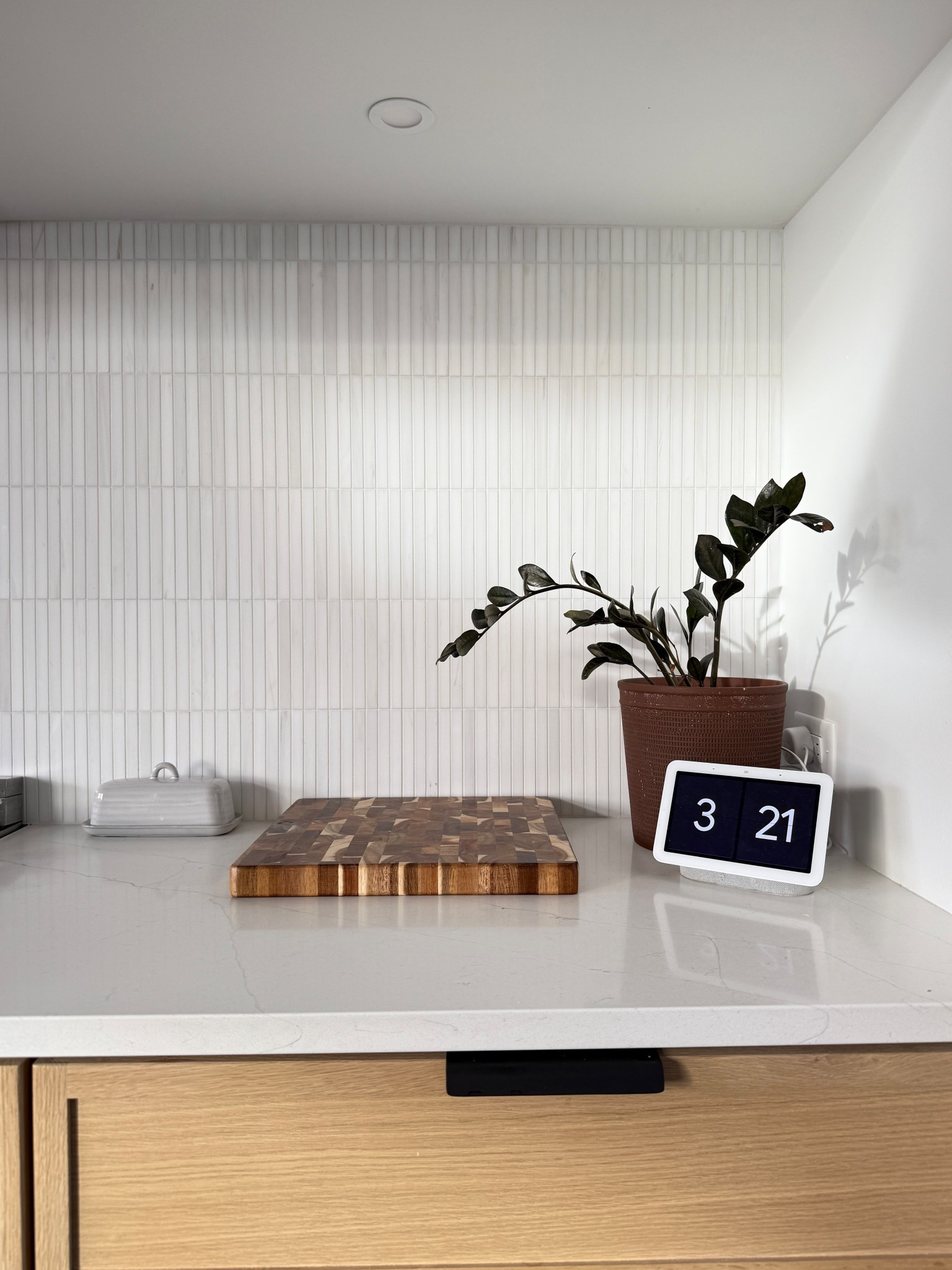 I always get asked about this little clock in our kitchen, but it’s actually a Google home and I just changed the display to have a clock on it

#LTKHome