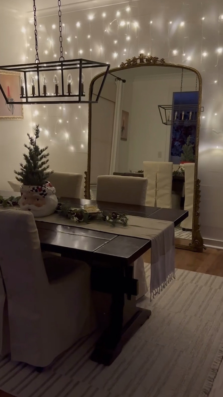 I hung curtain lights behind our new mirror from Anthropologie for a sparkly (and easy DIY) holiday look in our dining room. It’s so fun when you walk in the door to a wall of twinkle lights! Just use command hooks to hang them with! 

#LTKhome #LTKVideo #LTKHoliday