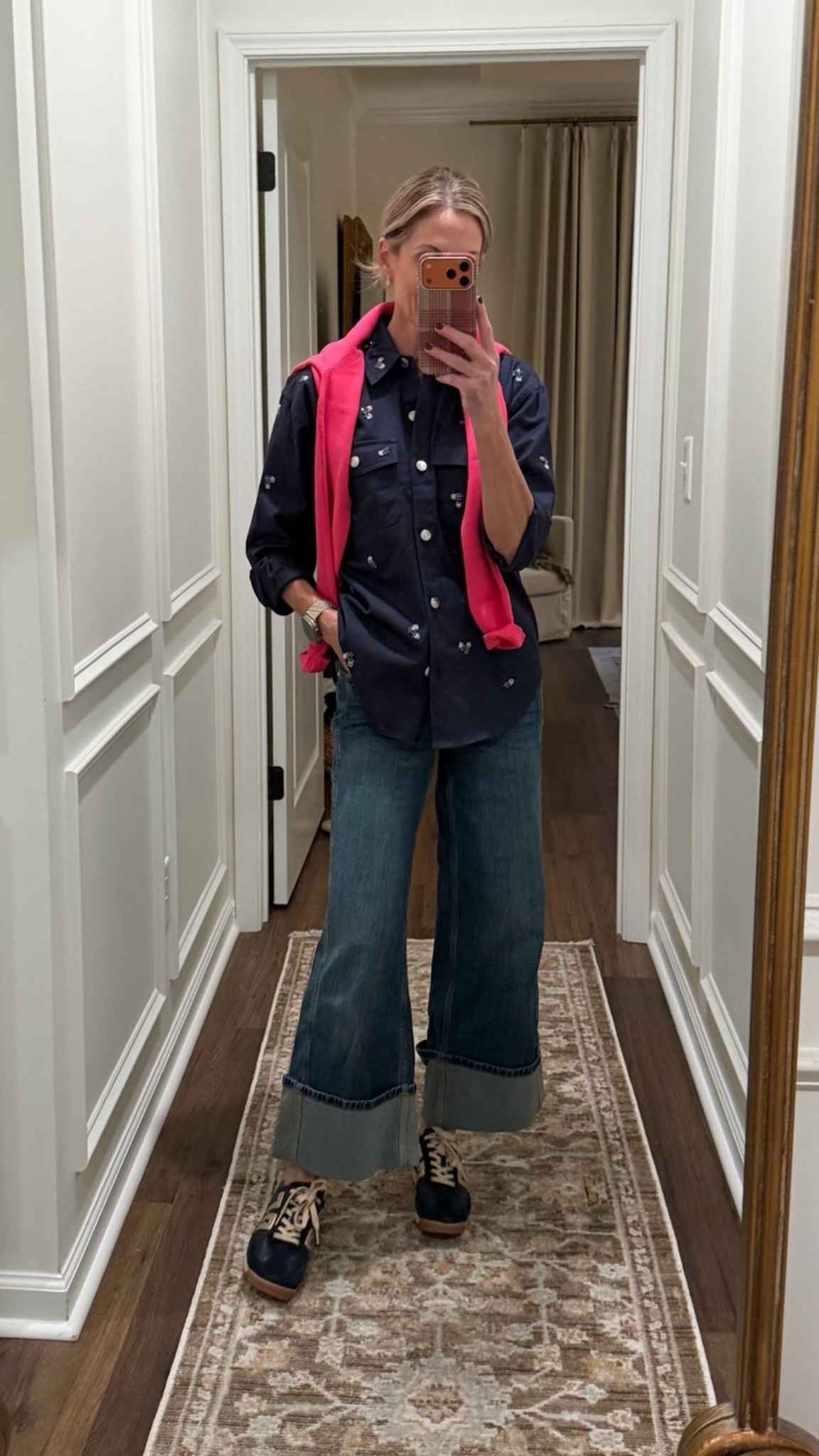 Headed to the ✈️ for a quick trip! So I changed real quick to another Walmart top and pop of color sweater.