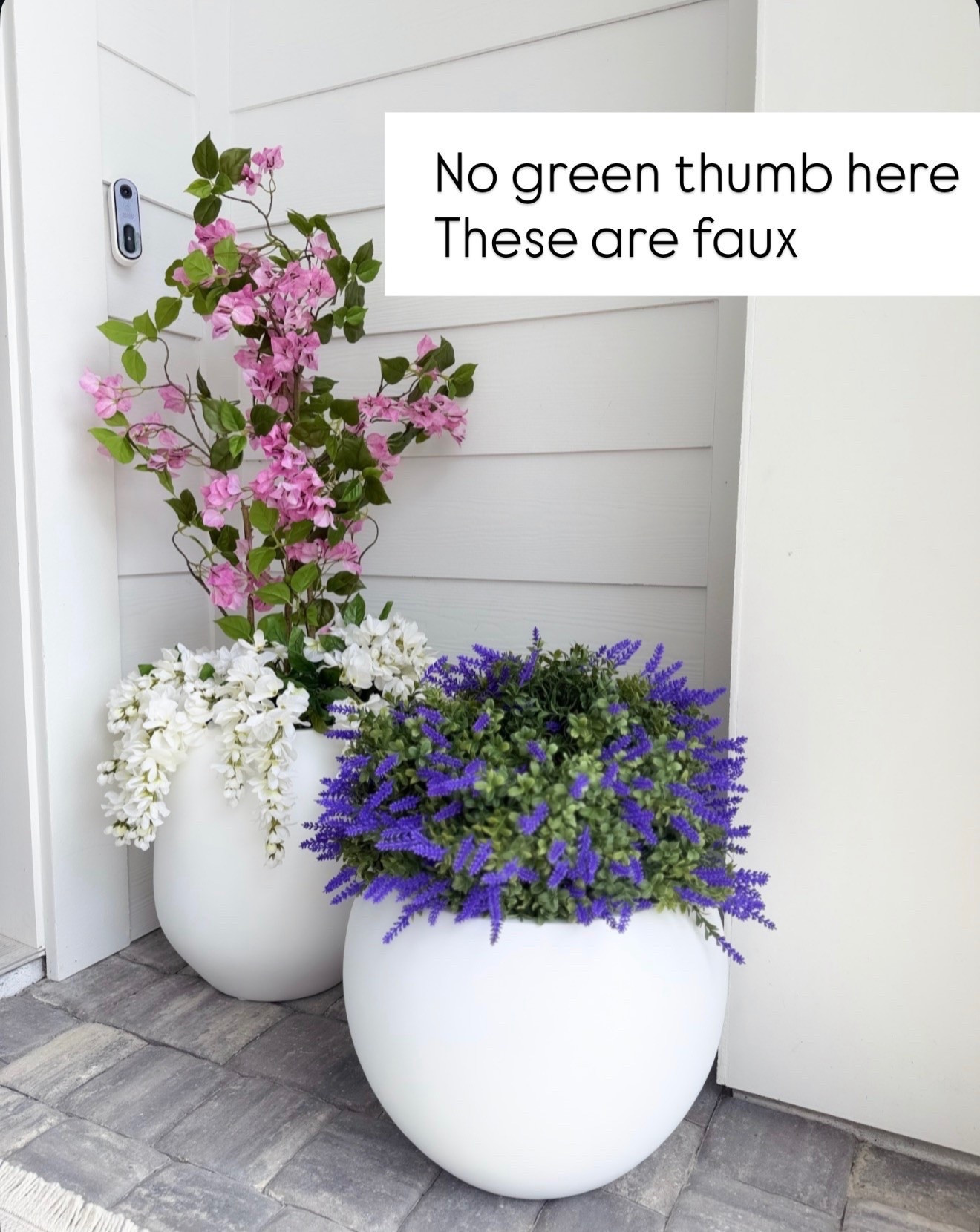 The mix of pink, white, and purple faux florals makes it feel high-end without any maintenance, and the oversized matte white planters keep everything looking elevated and modern. Perfect example of how faux greenery can still look super intentional and design-forward when you lean into good texture and color variation. No watering, no upkeep, just always styled.

home decor, faux florals, outdoor styling, porch decor ideas, modern planters, easy landscaping, curb appeal ideas, neutral home aesthetic, annabrstyle

#LTKHome #LTKSeasonal #LTKTravel