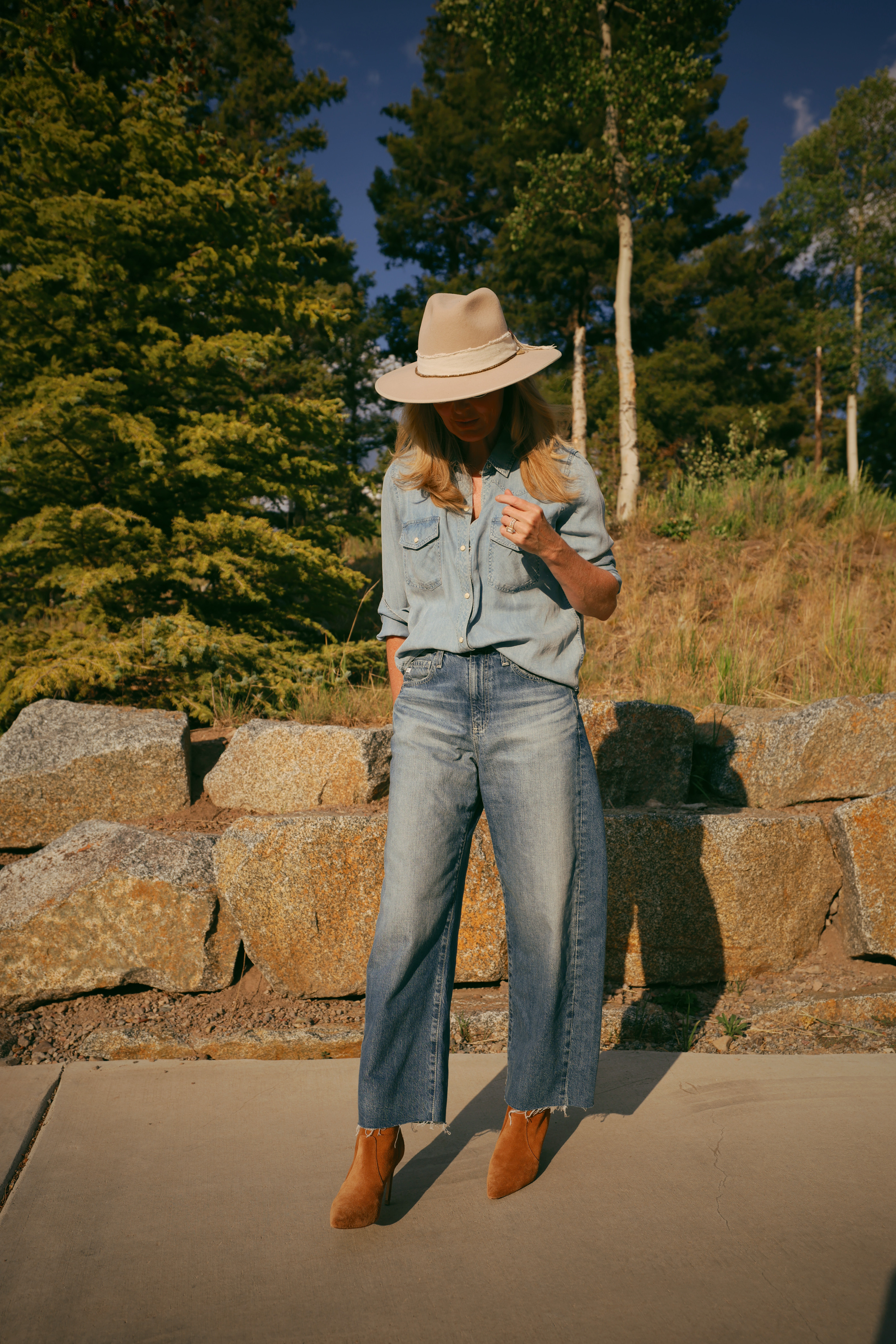 This is the quiet-confidence version of the outfit!

Same reliable pieces, just a softer moment. Chambray shirt, wide-leg jean, hat pulled low. Not every photo needs a big smile to sell an outfit, sometimes the clothes do the talking on their own.

#LTKootd #LTKOver40 #LTKSaleAlert