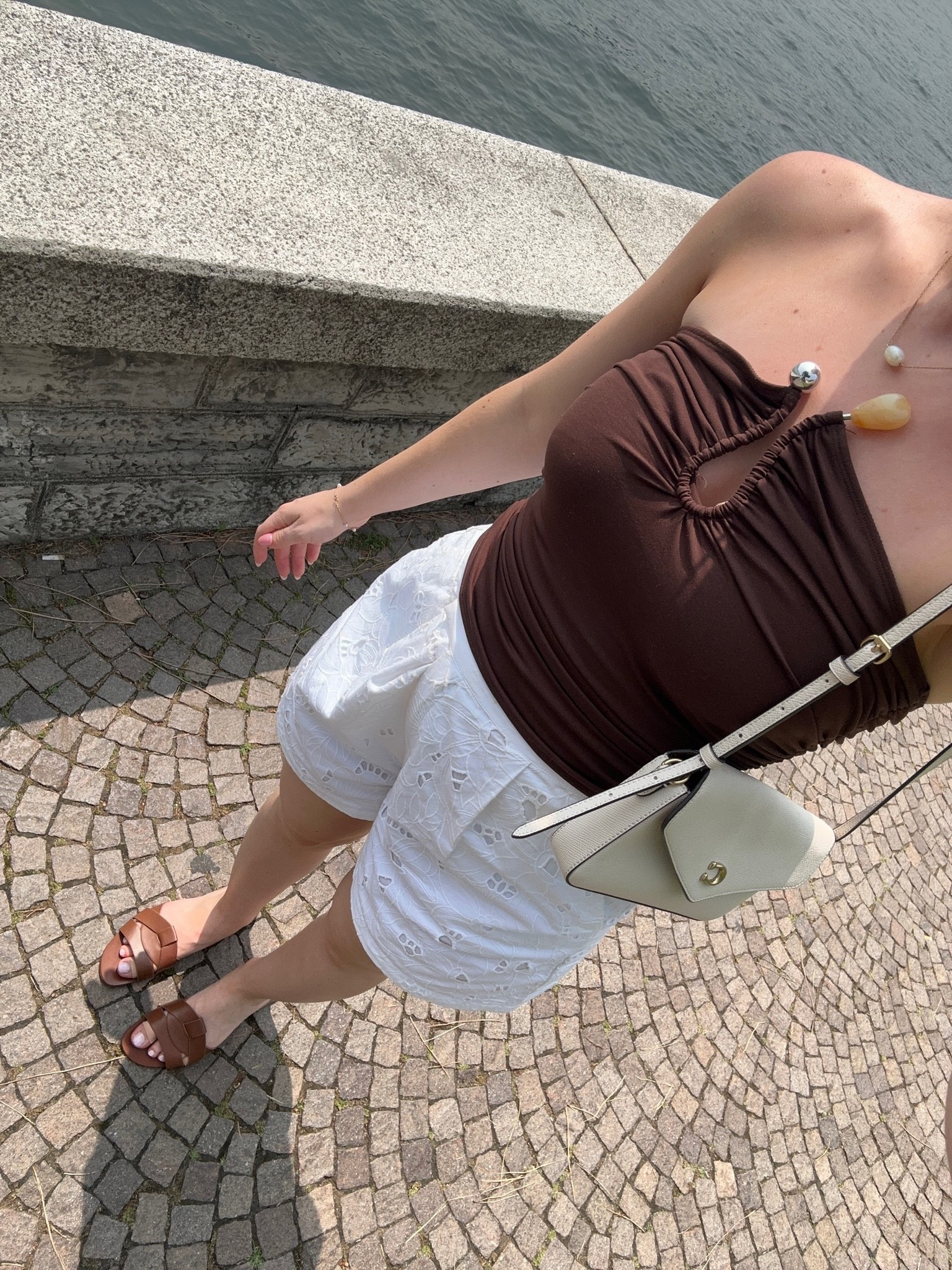 The kind of outfit I pack for every European summer 🤎🤍

A chocolate brown top, white broderie shorts and tan sandals are the easiest formula for a chic holiday outfit. Perfect for city strolls, lunch dates and vacation days by the water. Everything linked on my LTK ✨

#LTKuk #LTKsummer #LTKeurope