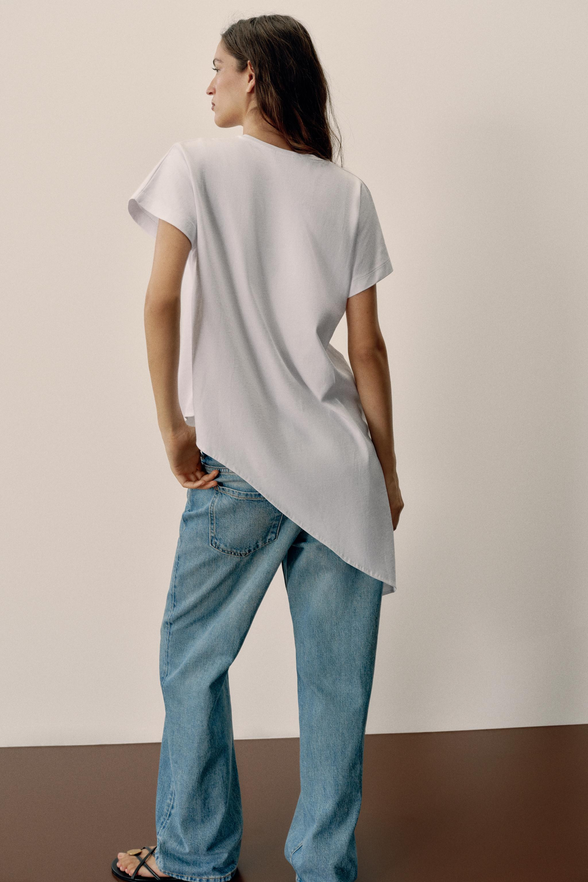 Model height: 183 cmREGULAR FIT - ROUND NECK - ASYMMETRIC LENGTH - SHORT SLEEVET-shirt crafted fr... | Zara UK