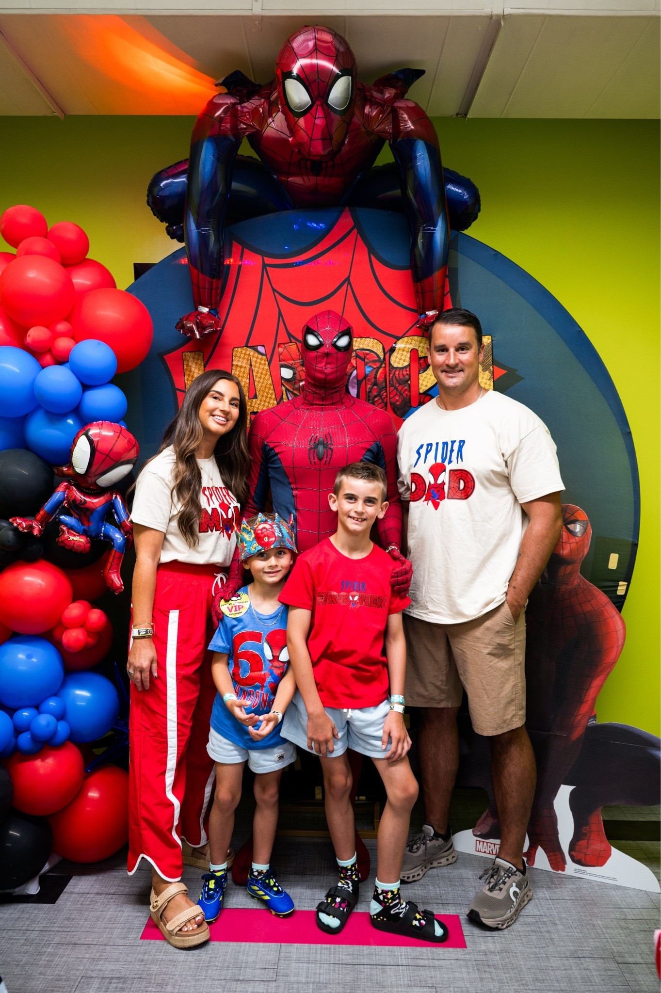 Spiderman birthday party backdrop decorations 
Boys spiderman birthday snirt
Mom and dad spiderman shirts
Womens red windbreaker pants-small
Boys blue shorts 
Boys soccer cleats blue