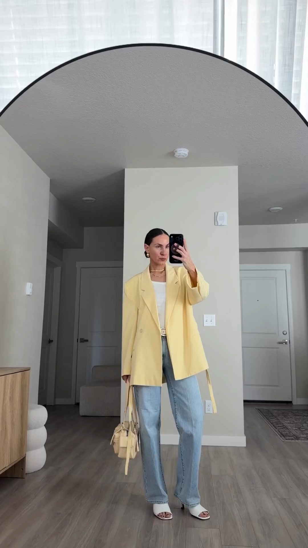 yellow blazer 
blue jeans