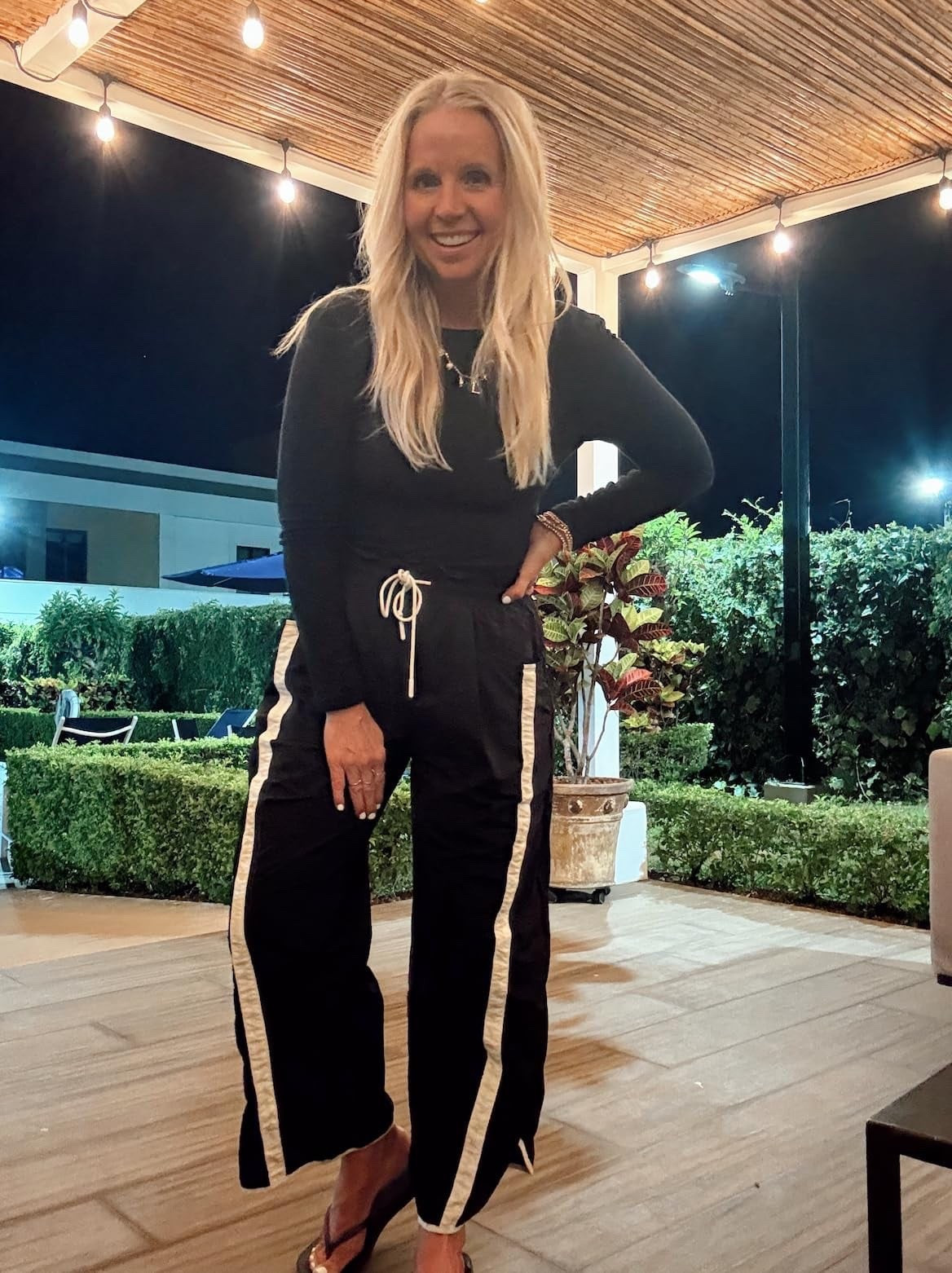 I'm wearing a medium in these track pants and a medium in the long-sleeve shirt. It has a low back and a built-in shelf bra with padding. Shop the look from Amazon!

#LTKootd #LTKOver40 #LTKTravel