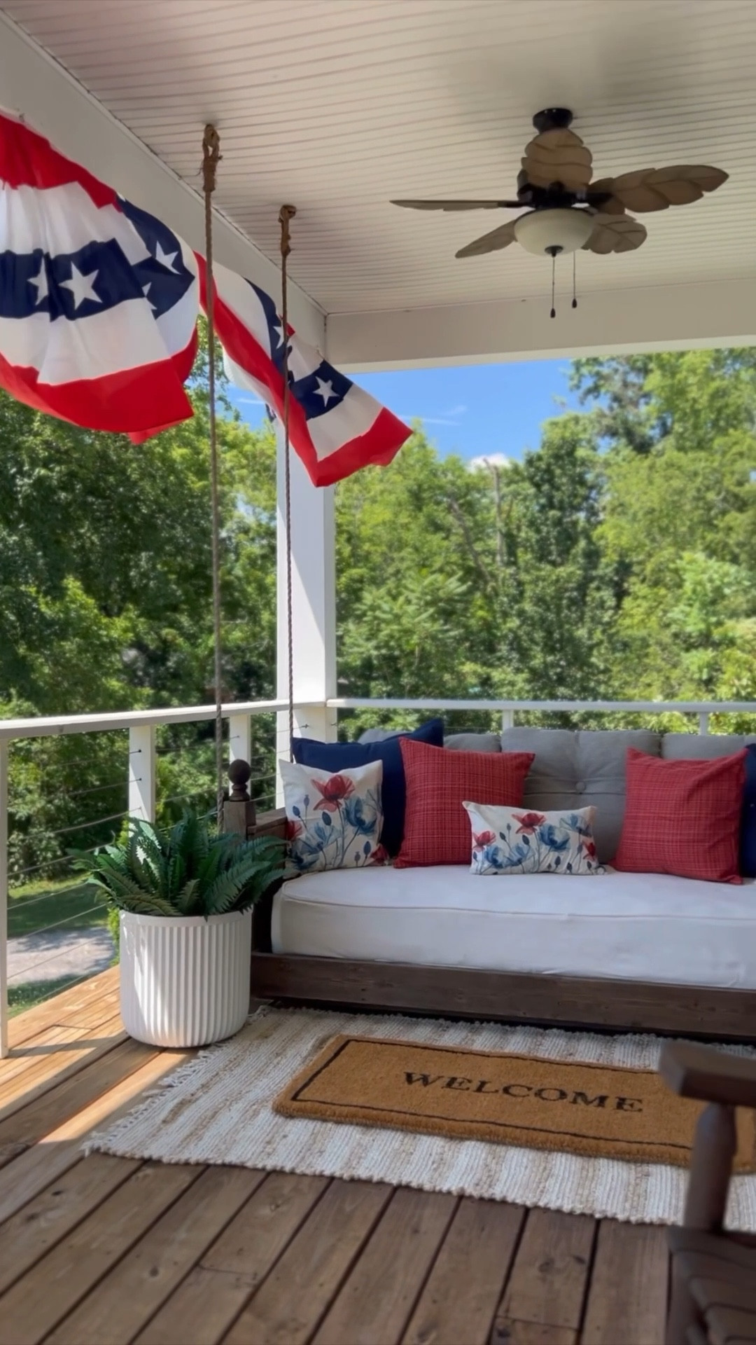 Red white and blue porch decor! I love doing patriotic vibes on my summer porch from Memorial Day to the 4th! These bunting flags have held up so well over the years and are super affordable!

#LTKvlog #LTKSeasonal #LTKHome
