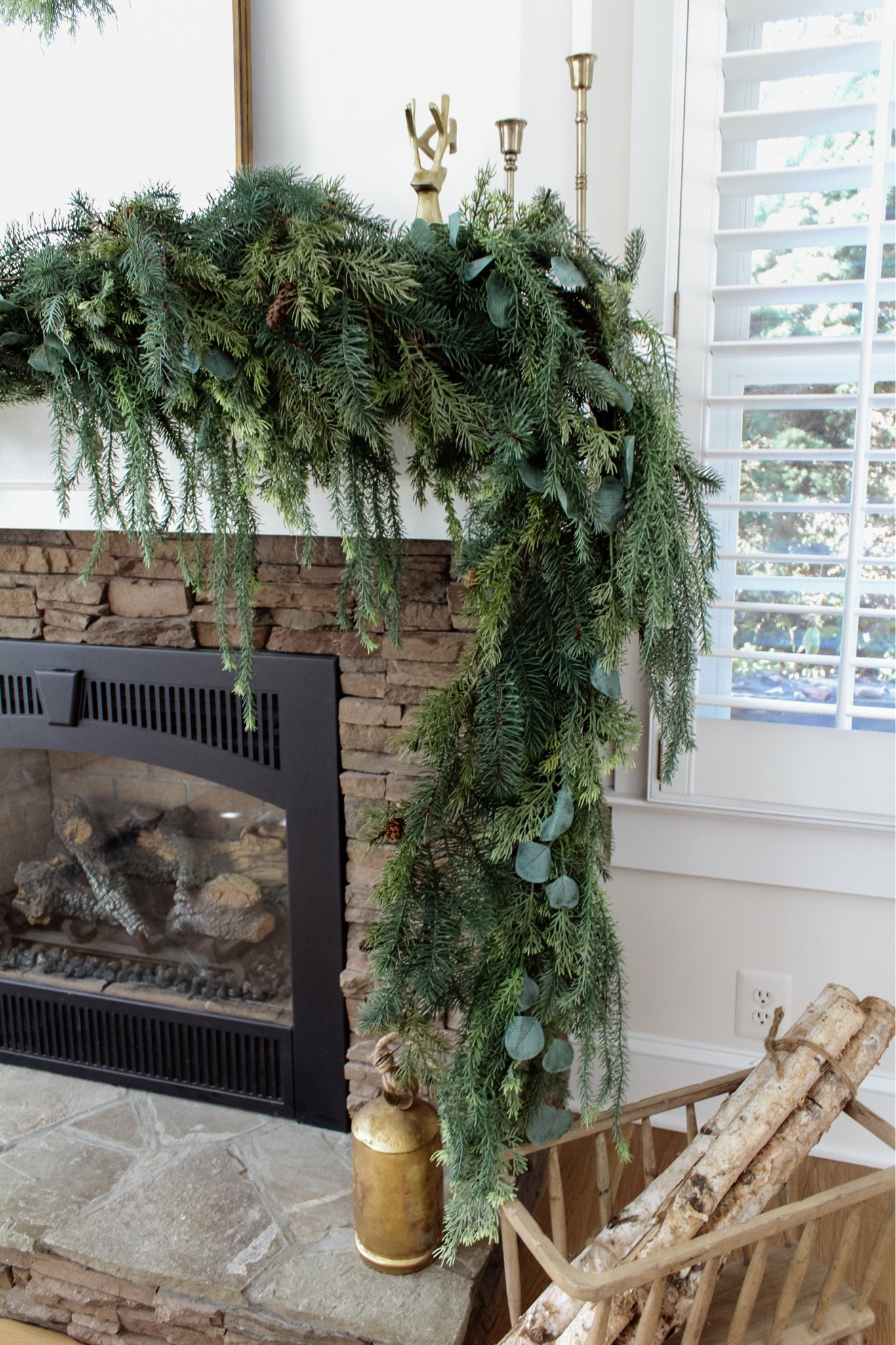 An affordable, realistic layered look, broken down:
-Three layers of the @michaelsstores garland linked in my bio / on my holiday home tour page
-One strand on the left, two strands on the right for an angled, draped look
-One strand of my other favorite @michaelsstores garland woven into the right end piece for a mixed greens look
-There are metal wires throughout that make it easy to use command hooks for placing on your mantel!
•
Shop all of the garland that is currently 40% off, at just $21-$29 a strand, as well as the rest of my mantel decor from the link in bio! Shop the entire holiday decor shop from top retailers there, too.
•
•
•

Fireplace mantel garland, Christmas garland, affordable holiday home decor, Michael’s garland, stocking decor, holiday home tour, neutral Christmas, simple Christmas decor, brass decor, holiday home inspo, candle holder, mirror, brass decor, nutcracker, hanging bells 

#LTKHoliday #LTKunder50 #LTKhome