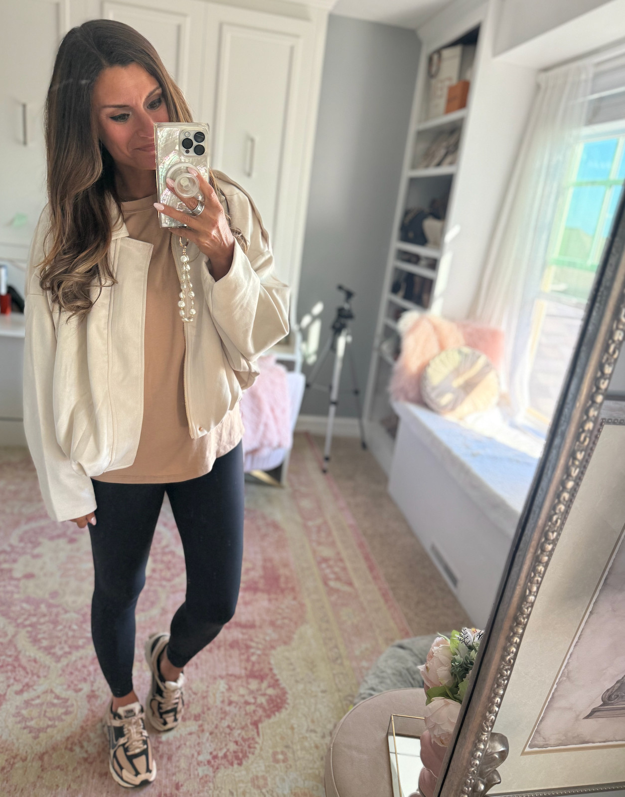 Casual fall outfit with a jacket, oversized tee, leggings, and sneakers 

 #LTKFindsUnder50 #LTKStyleTip