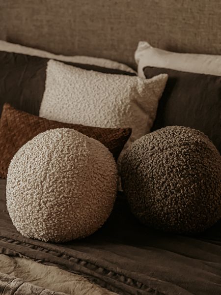 Unveiling one of my cherished Christmas gifts! This stunning bouclé sphere pillow, a delightful addition to any sofa or bed, instantly elevates the decor. Its playful texture complements other pillows or stands out as a stylish statement piece. A must-have from the exclusive Sarah Sherman Samuel collection, embodying her signature warmth and curated style. 

#LTKstyletip #LTKhome #LTKfindsunder100