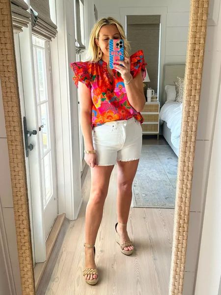 These are the cutest white denim shorts and I’m wearing a size small. I love the pop of color that this top brings to any pair of shorts or jeans for spring and summer. I’m wearing a size small use code fancy15 for 15% off the whole look.

#LTKstyletip #LTKfindsunder100 #LTKSeasonal