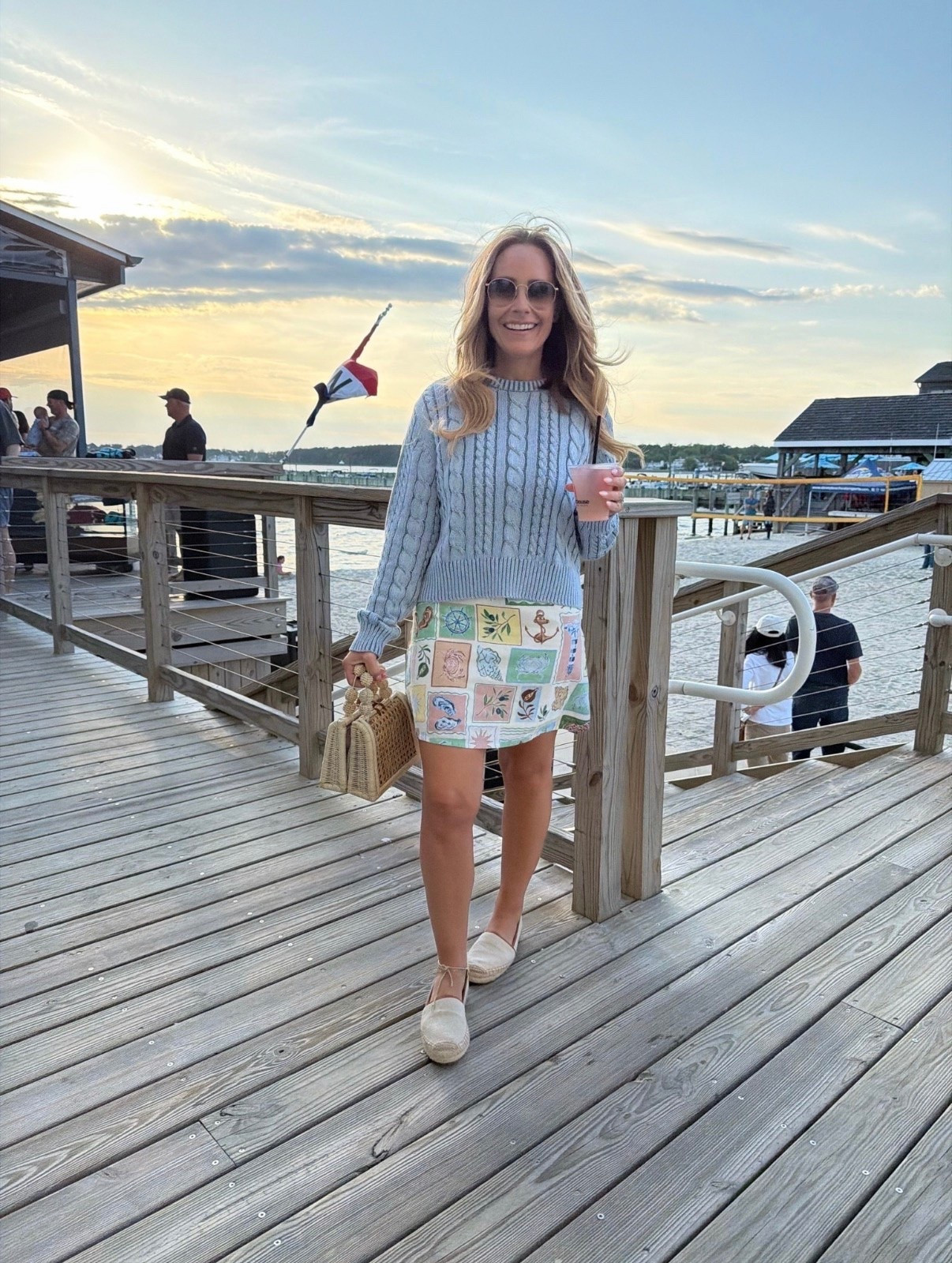 🩵 The outfit that feels like summer by the water—even when the breeze says otherwise. This lightweight cable knit sweater paired with the cutest coastal-inspired skirt is giving Nantucket weekend energy in the best way. Finished it off with woven accessories and comfy espadrilles for an easy look that works from dinner on the dock to sunset cocktails. ⚓️✨

#LTKStyle #CoastalStyle #NauticalFashion #SummerOutfit #VacationStyle #ResortWear #PreppyStyle #BeachTownStyle #Espadrilles #LTKTravel