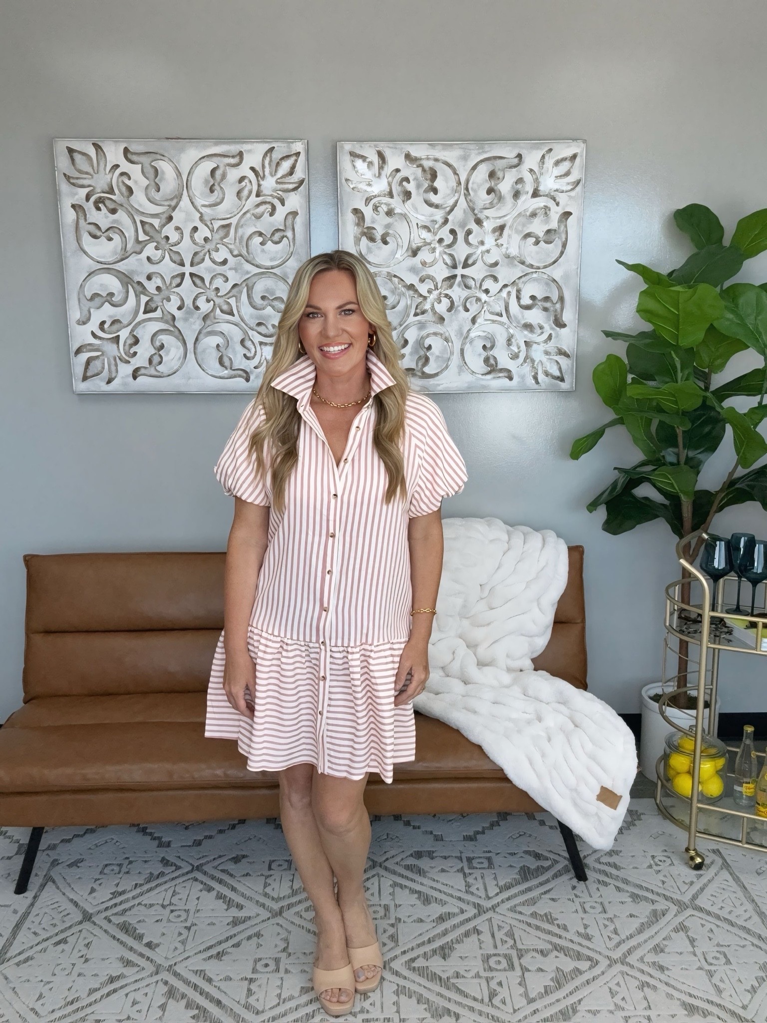 The pink striped shirt dress with the statement collar that instantly elevates the look. The relaxed silhouette gives it that effortless, polished feel while still offering plenty of movement and comfort. Styled with neutral wedges and gold accessories for a look that works for brunch, the office, travel days, and everything in between.

Sizing:
• Dress: Small
• Wedges: Size 7.5, true to size

pink striped dress, striped shirt dress, collared dress, statement collar dress, summer dress, spring style, workwear outfit, office style, brunch outfit, vacation outfit, feminine style, neutral wedges, gold jewelry, elevated everyday style, polished outfit, classic fashion, resort style, boutique fashion, women’s fashion, AudrieDollins

#LTKWorkwear #LTKootd #LTKOver40
