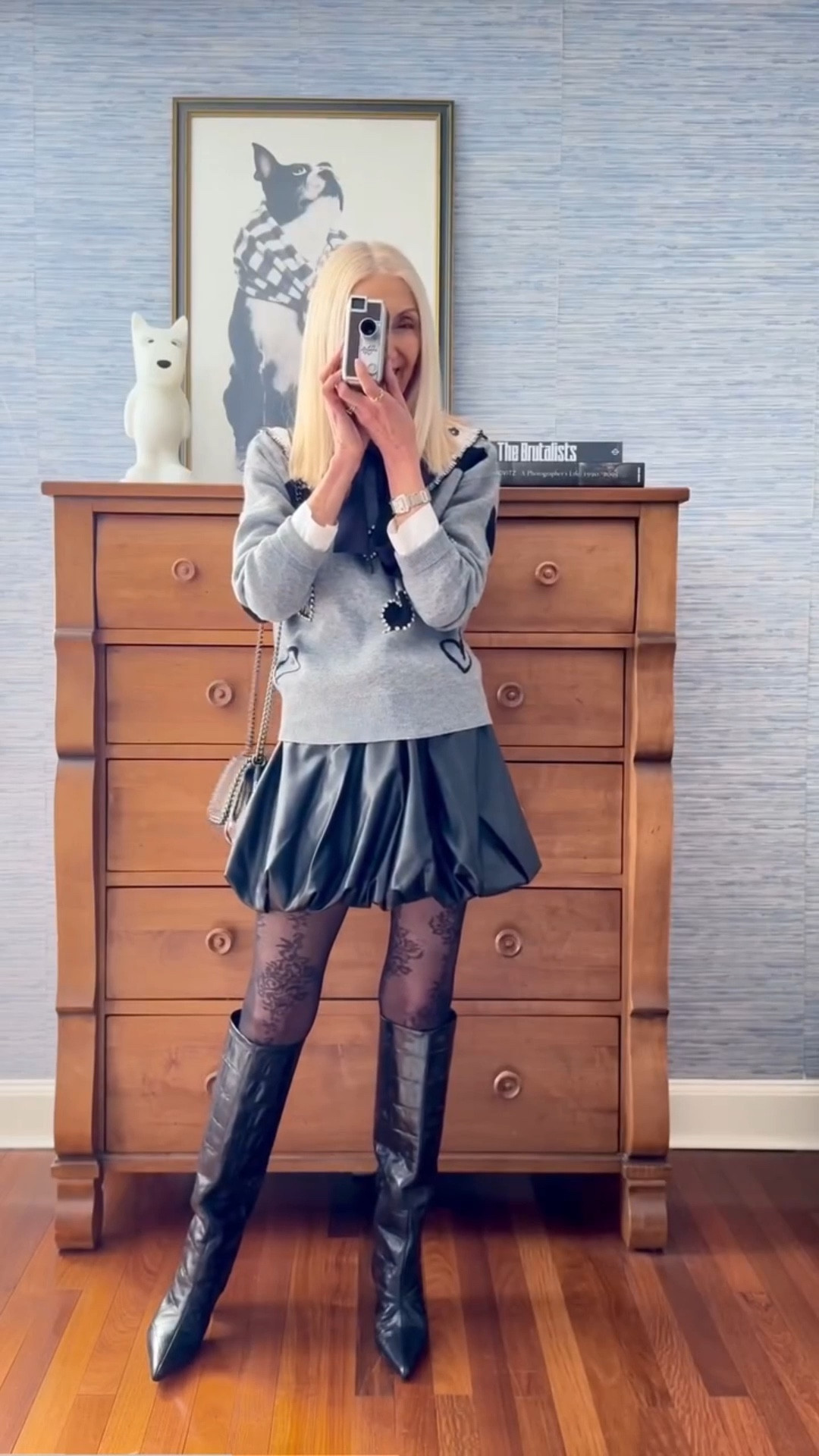 10 textures 3 colors! Playing with lots of textures is easy just by limiting your color palette. It’s a style hack that’s virtually foolproof and somewhat low effort. And I’m not talking just neutral colors like I used here. Bolder colors look equally effortless. A simple place to start is with different textures in a 1 color monochromatic look. Chicness guaranteed! 2 or 3 colors will give you something a little bolder. Just pile it on and have fun! Happy Galentines Day! 🖤🤍🩶

Sweater: @nanettelepore_official 
Skirt: @ronnykoboofficial 
Boots: @bronxshoes 
Shirt: @zara 

#styleinspo #styletips #styleatanyage #agelessstyle #valentinesstyle #ltkover50 #ltkover60

Pussy bow * bubble hem skirt * croc boots * jeweled sweater * big collar * hearts * valentines outfit * valentines look * lace tights * super 8 camera

#LTKgrwm #LTKOver40 #LTKValentine