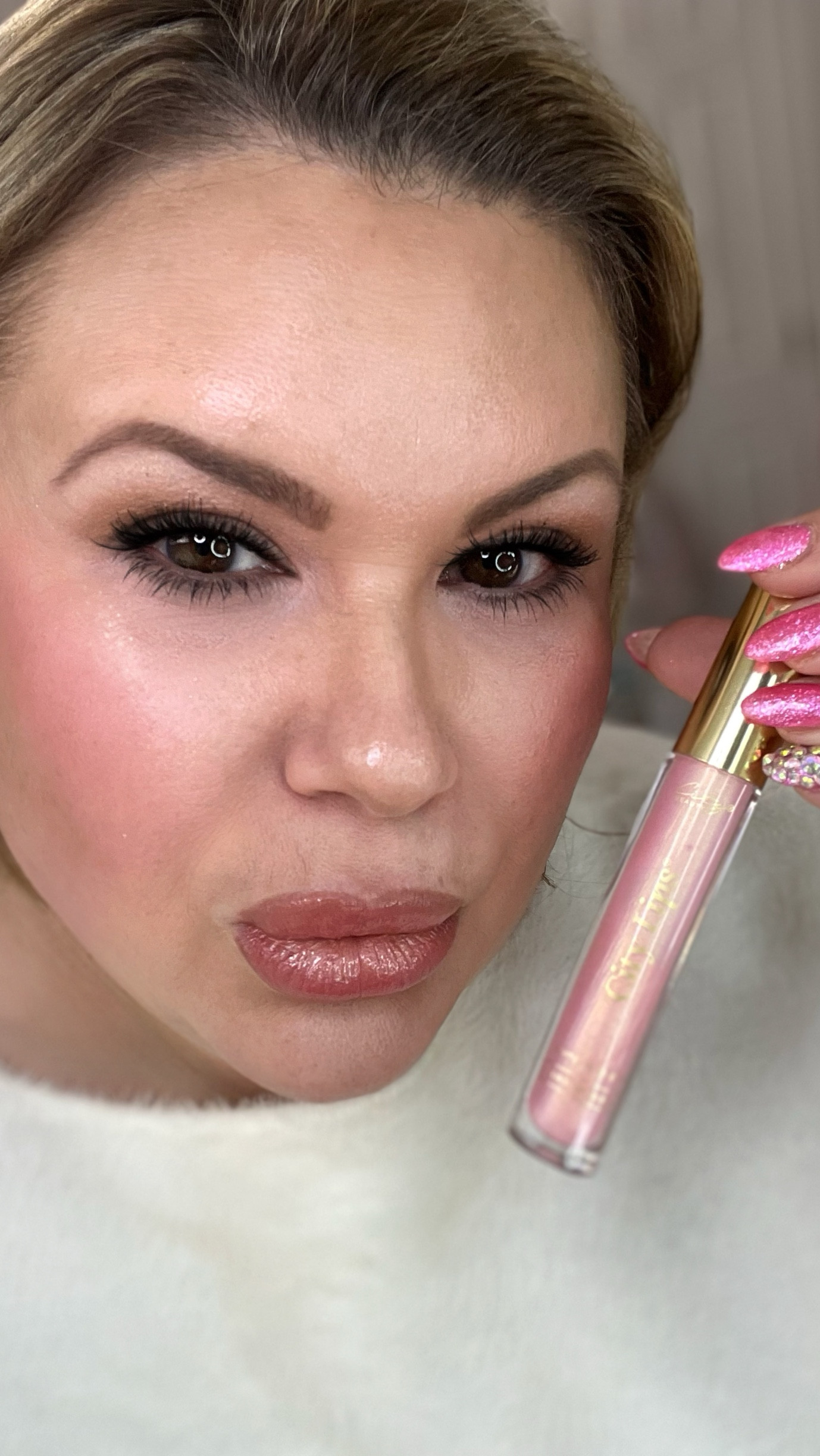 City beauty has the best lip plumper around. It fills in all the fine lines and adds volume to aging lips. It is a must have! I love the color Los Angelips. It is the perfect pinky gold and looks great on its own or as a topper.

#LTKBeauty #LTKPlusSize #LTKFindsUnder50