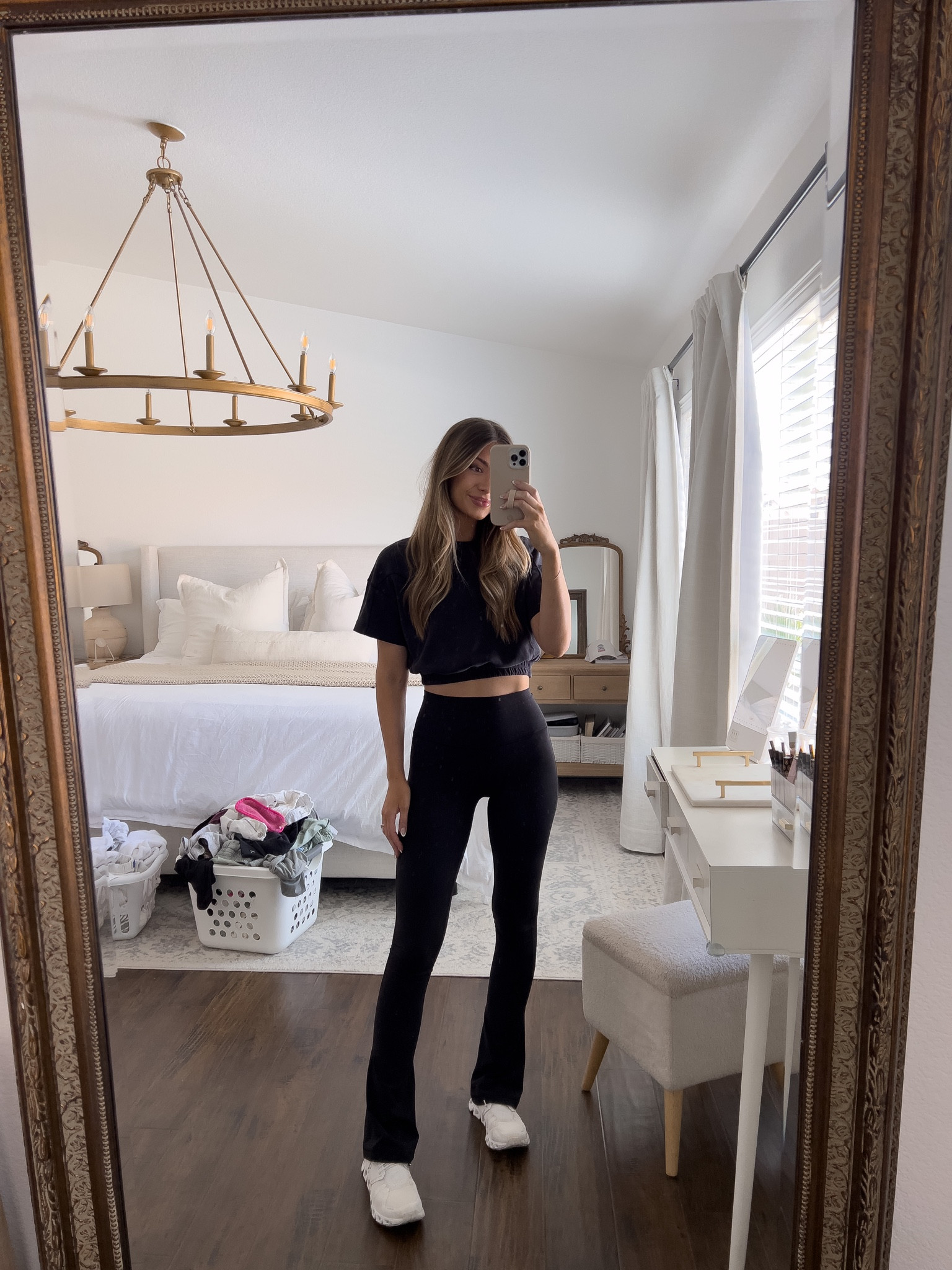 Black athletic crop top for working out and these mini flares! Top is no longer sold but the pants are available in all sizes and come in different colors! They fit tts (wearing a size 4) 

#LTKfit #LTKunder100