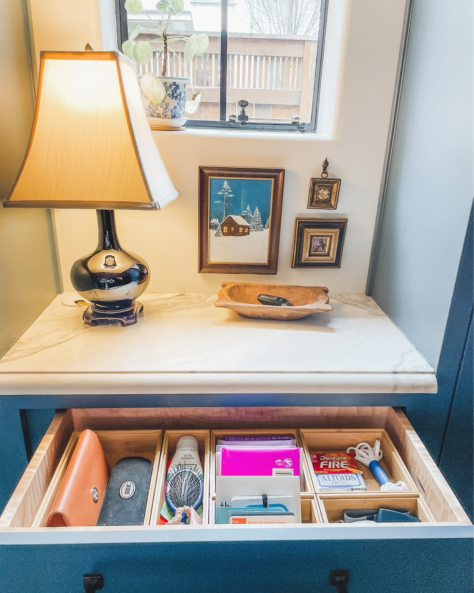 The coziest little mudroom nook pairs perfectly with this ultra-organized “junk drawer.”

Although, you can hardly call it that with this level of organization!

In case you are embracing this cold spell and working on  organizing a few spaces of your own, check out our stories for hacks from Indy Organizers!