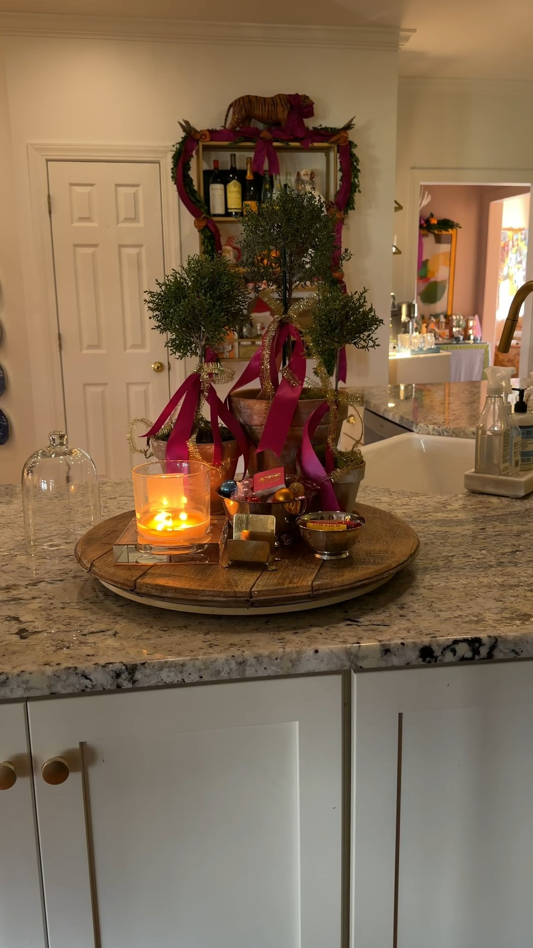 Love this kitchen vignette, 2 of the topiary’s are fake, the tallest one is real 

#LTKHome #LTKHoliday