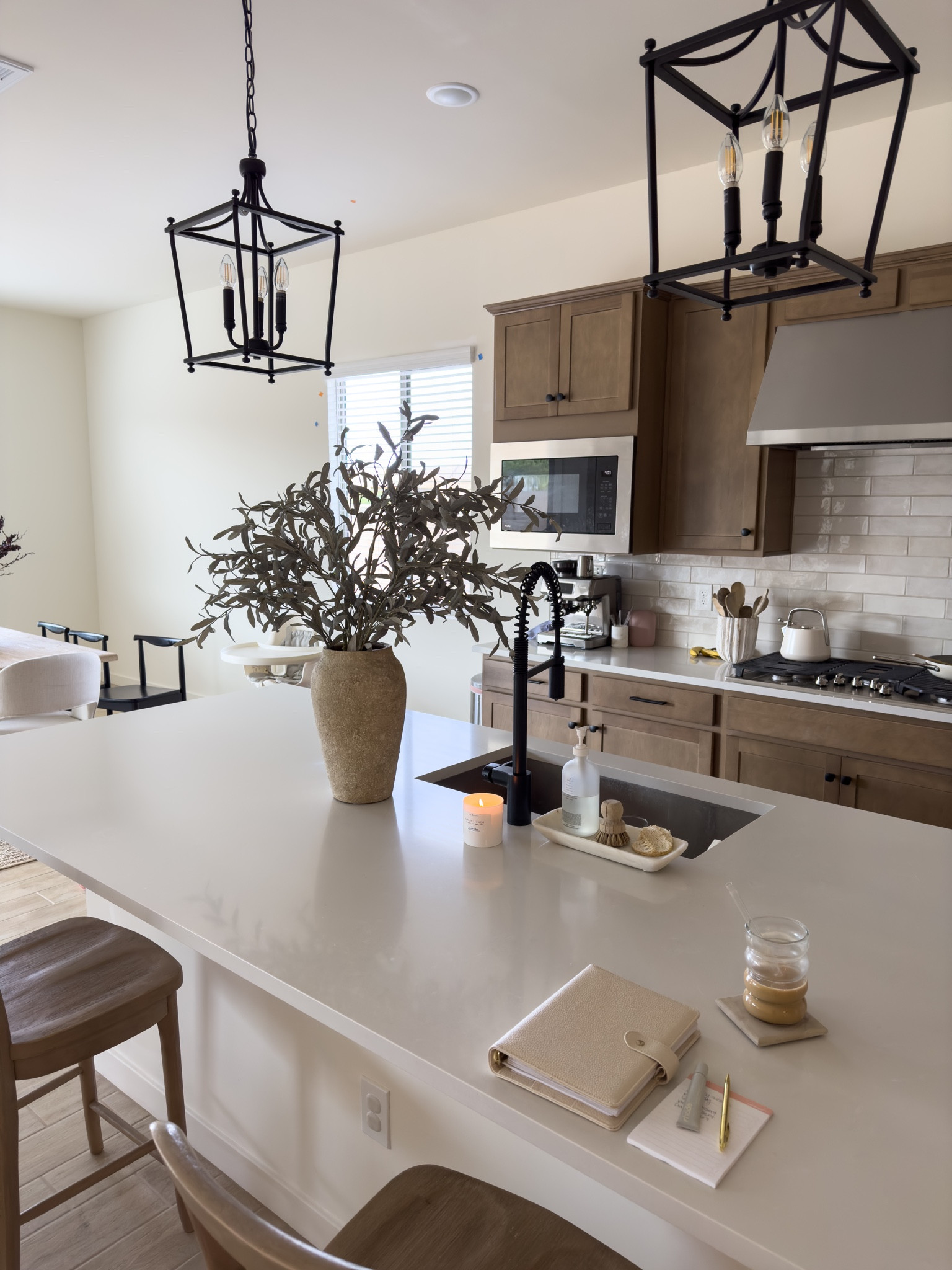 new terracotta vase and faux olive branches (vase size - urn) and I have 2 olive branches in here that I bent to make a tad shorter. I like these olive branches because they’re faded so they don’t look as fake looking imo! Linking similars for the other items sold out! 

#LTKhome