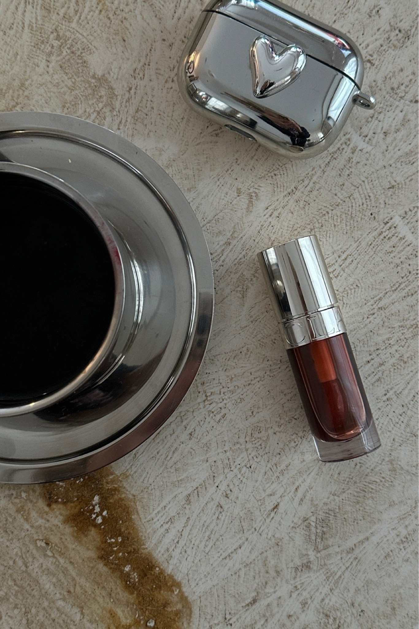 The new lip oils from Clarins are so gorge, they’re like putting honey on your lips. Check out my next post to see what this looks like on me 💋 💋
Dark red lip gloss | Cherry red | Holiday makeup | Beauty ideas for summer | Silver heart AirPods case | Silver chrome cup saucer 

#LTKsummer #LTKbeauty #LTKpartywear
