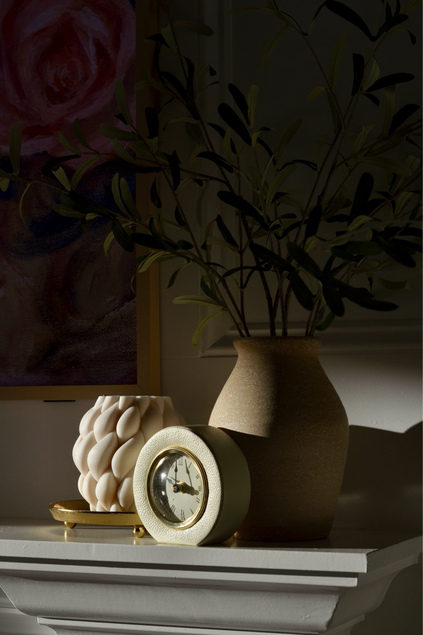 Fireplace decor - candle, clock, faux olive branch 