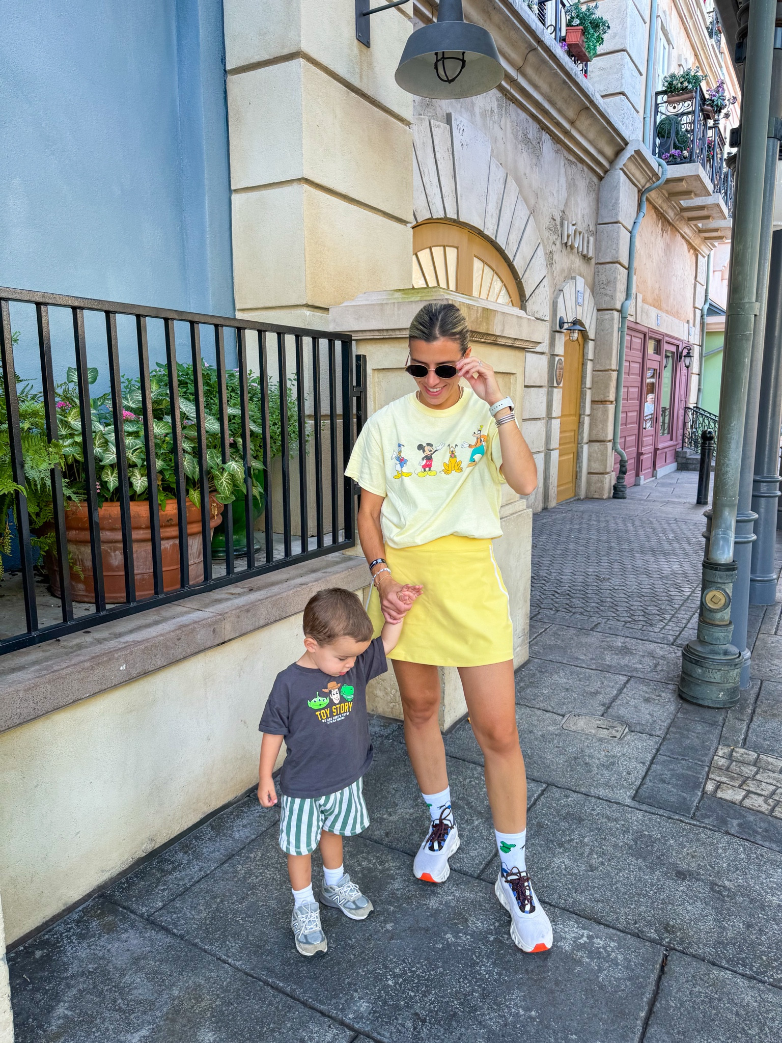 Sized up in the skort 
Disney shirt is old Urban Outfitters 
Hudson’s outfit zara

#LTKFindsUnder50 #LTKFitness