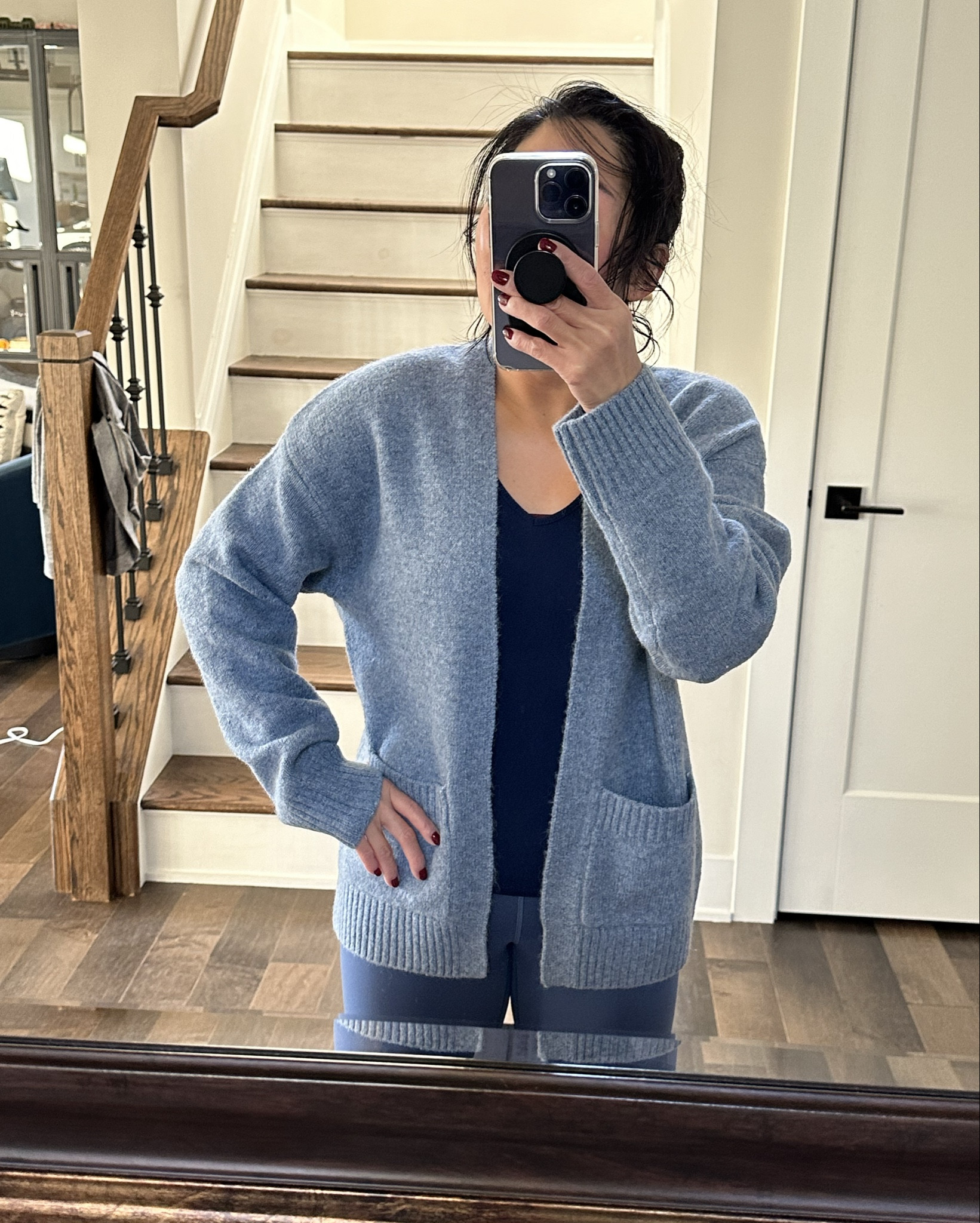 One size, on sale now and comes with a detachable scarf! 