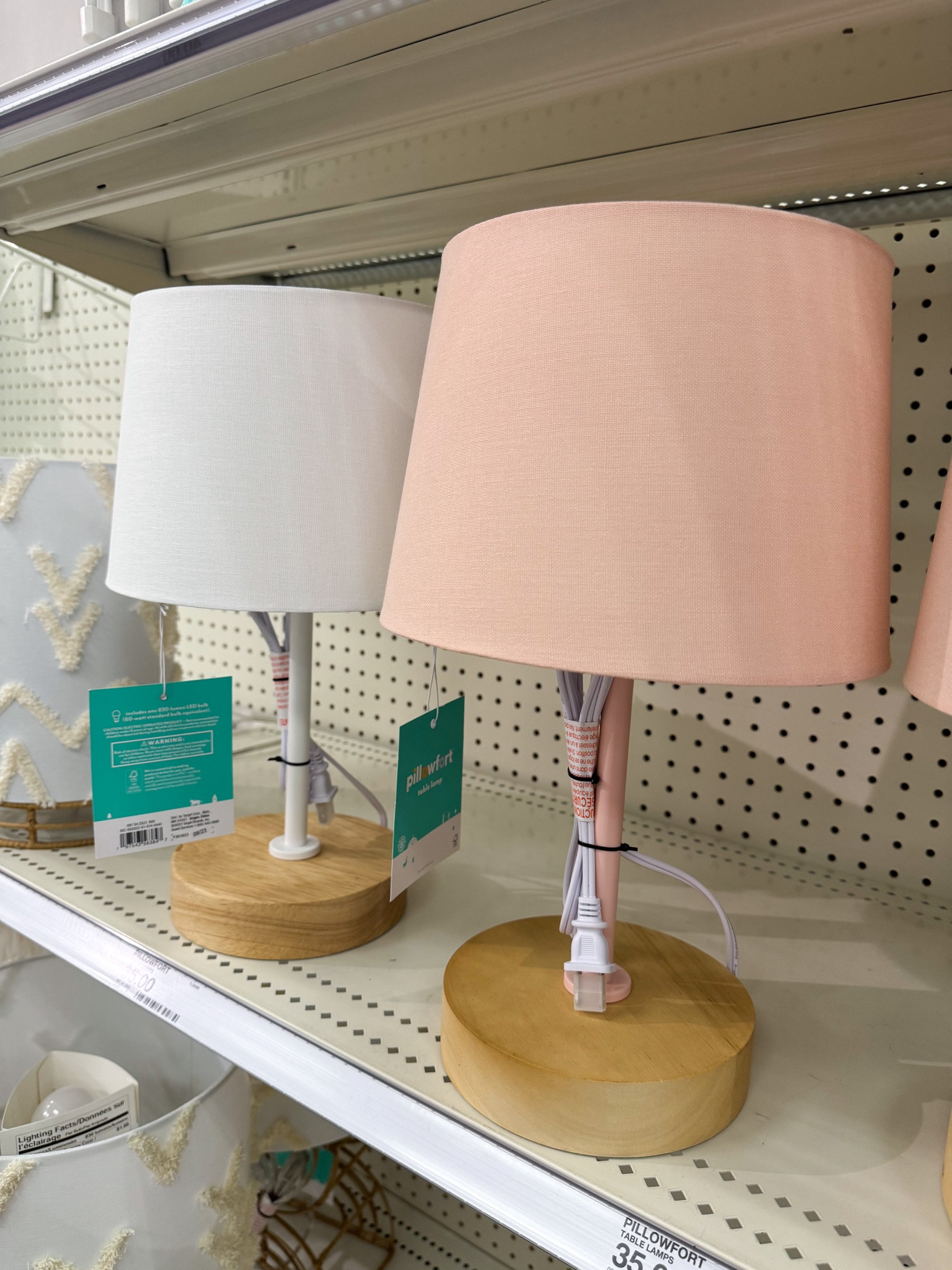 From the target app:

Brighten up your kid's space with this freestanding Table Lamp from Pillowfort™. This table lamp features a drum-shape fabric shade with metal frame and standing on a round base made with wood material for a graceful look. Simply place this table lamp on the side table and light it up using the one-way on/off switch to add a warm glow to their space.

#LTKkids #LTKstyletip #LTKhome