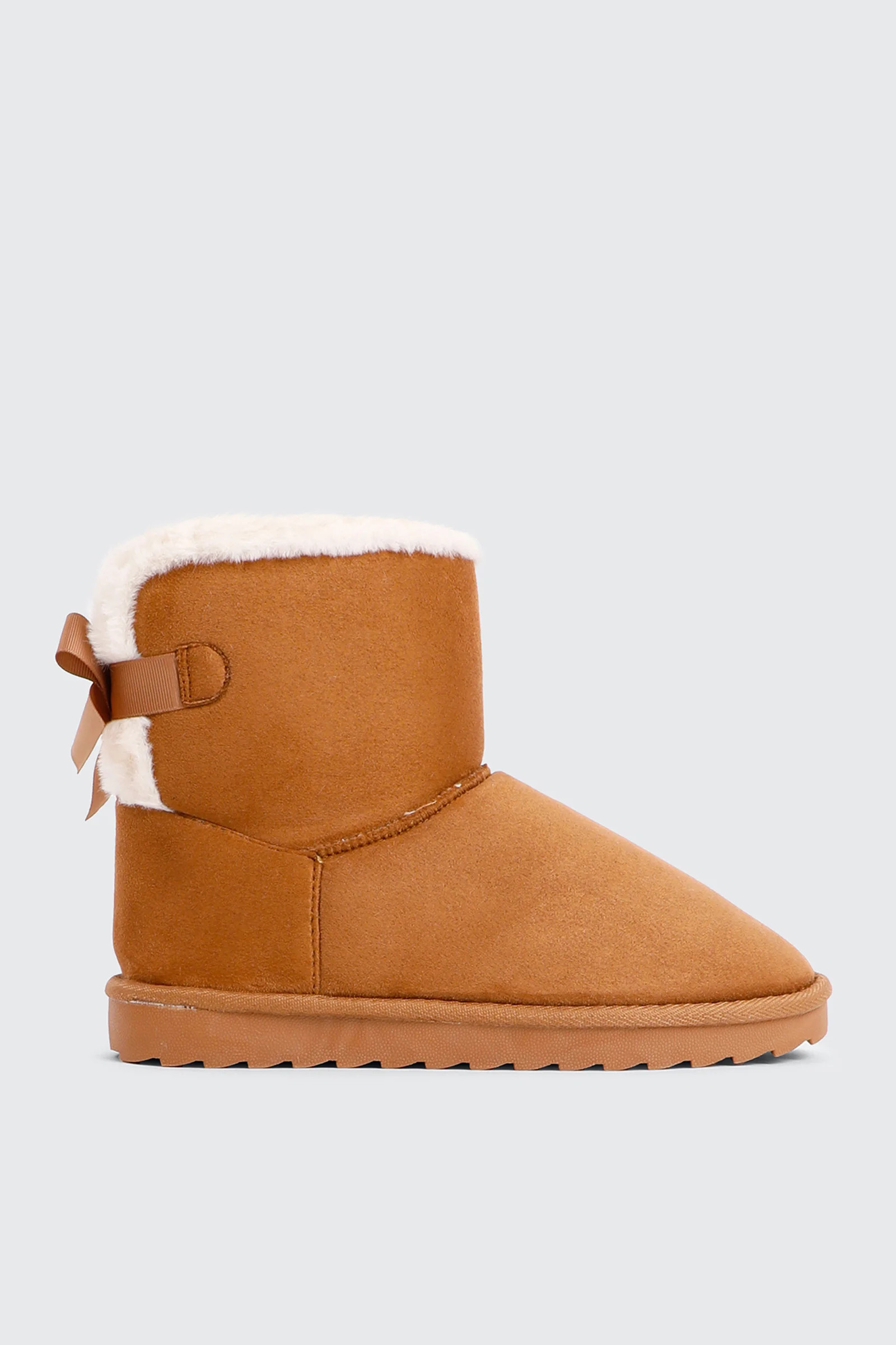 Platform Faux Sheepskin Boots with Bow | Ardene