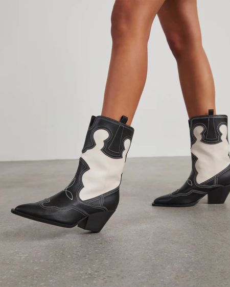 White and black western cowgirl boot. Use code ashleybeary for a discount! 

#LTKSeasonal #LTKfindsunder100 #LTKshoecrush