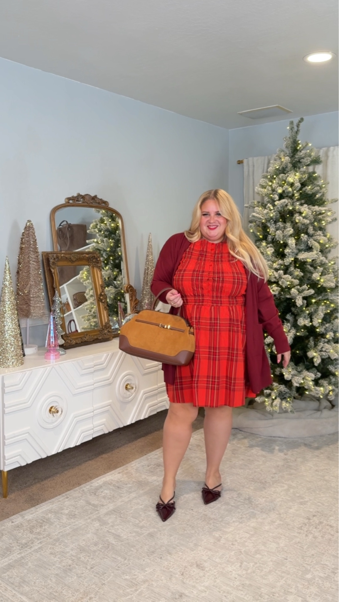 Cardigan is only linked on Instagram 

Same plaid dress, styled up for running errands or a casual holiday day.

I added a soft cardigan and my everyday bag plus bow heels to make it feel a little more put together without losing the comfort.

Dress size XXL
Cardigan size XXL
Heels true to size
Bag Yes please!

Festive, easy, and wearable.

#LTKPlusSize #LTKHoliday