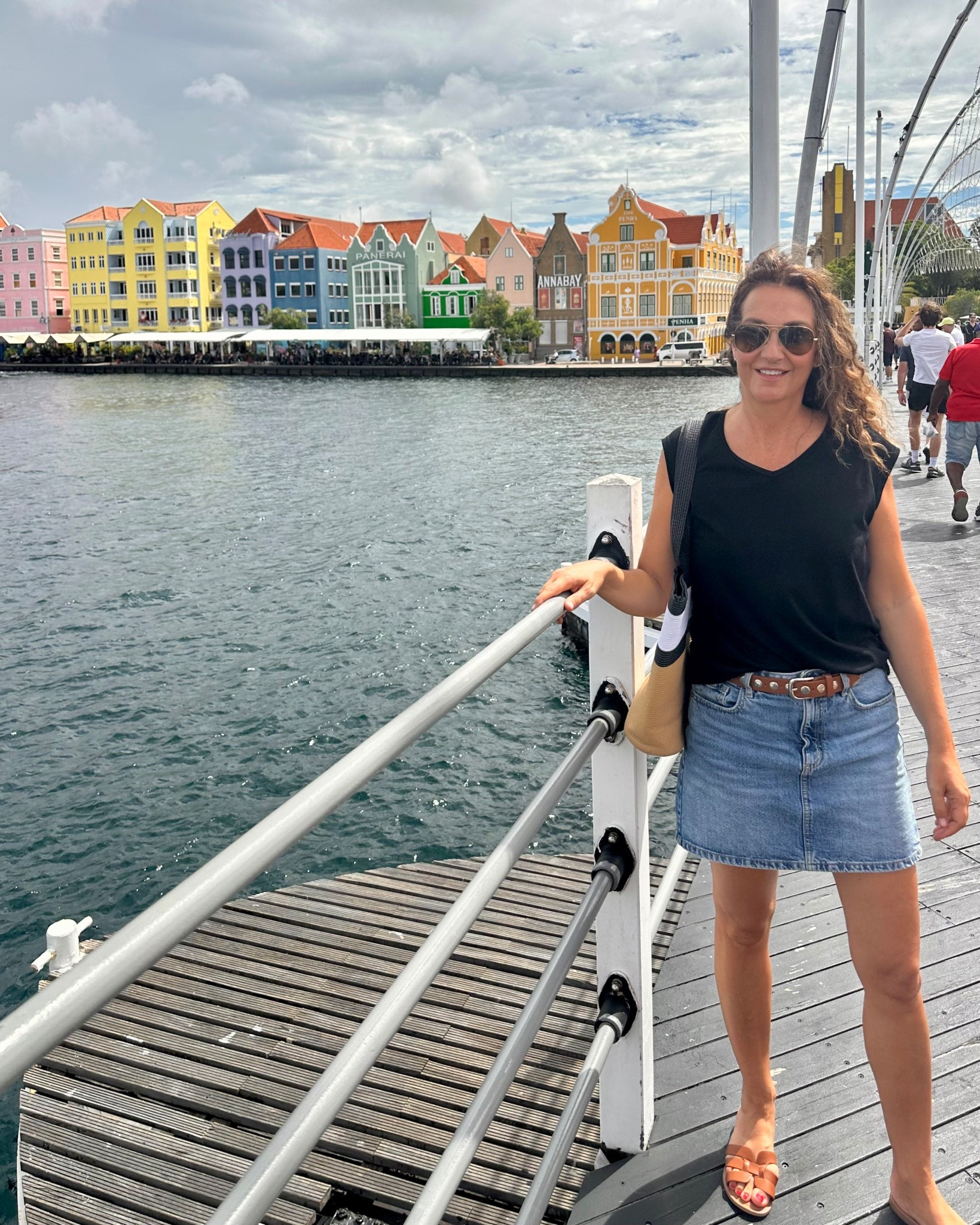 Tourist ootd! I wear this denim mini skirt so much, more comfortable, elevated and versatile than denim shorts! 
I’m 5’ 7” size 4ish wearing my usual size S in the skirt and tee. The sandals are very comfortable for walking but fit narrow, I went up 1/2 size


#LTKTravel #LTKootd #LTKFindsUnder50