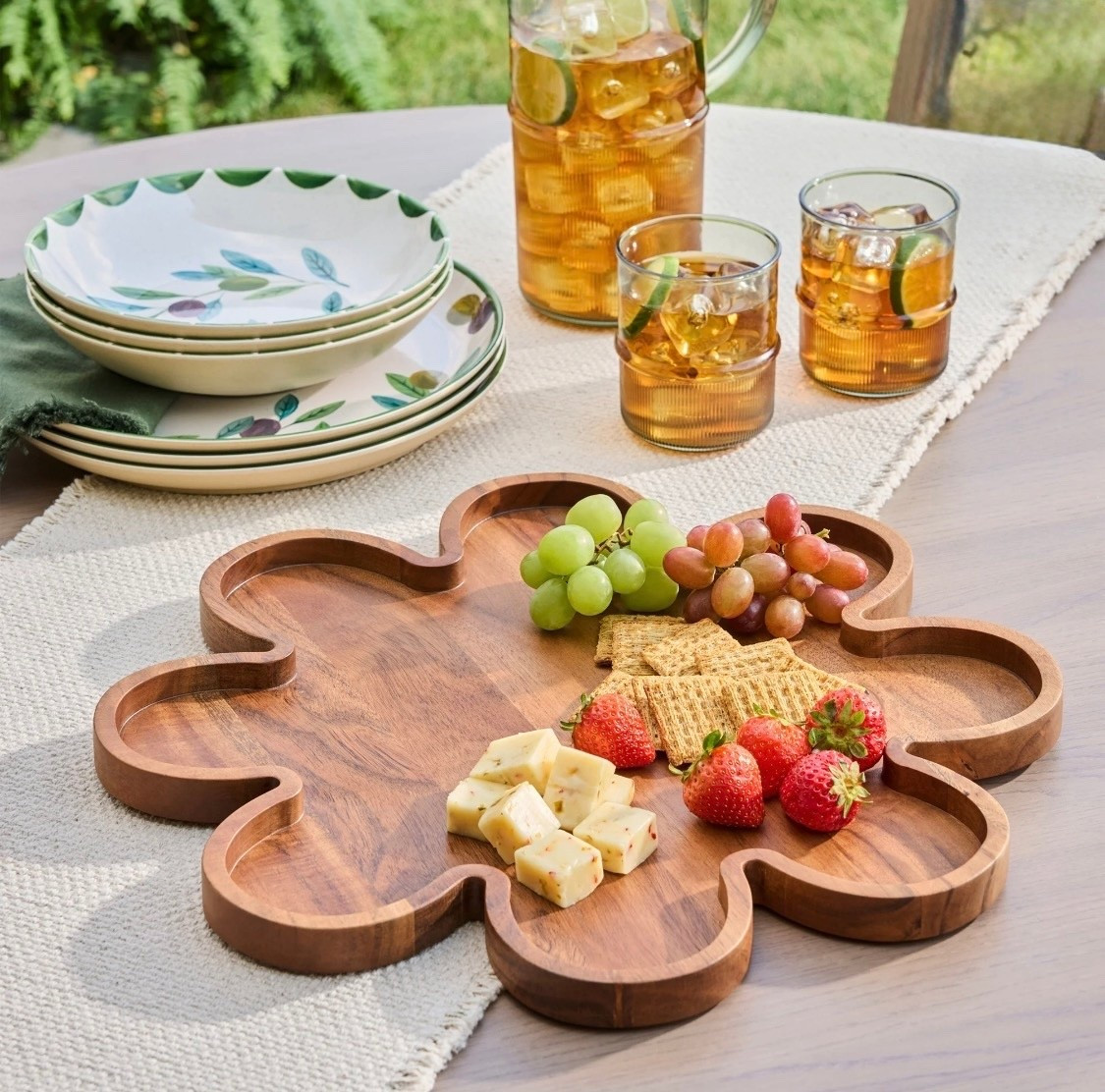 Discover the beauty and functionality of the Better Homes & Gardens Floral Acacia Wood Serving Platter. Crafted from 100% natural, sustainably sourced acacia wood, this serving platter is not only environmentally friendly but also exceptionally durable and resistant to wear. The platter features a unique floral shape that adds a decorative touch to any kitchen. Its naturally strong acacia wood construction resists cracking and ensures long-term use. Ideal for both style and serving, this board makes food display an elegant experience. Perfect for everyday use, it’s easy to clean and maintain, ensuring it remains a staple in your kitchen for years to come.

#LTKHome #LTKSeasonal #LTKmomlife