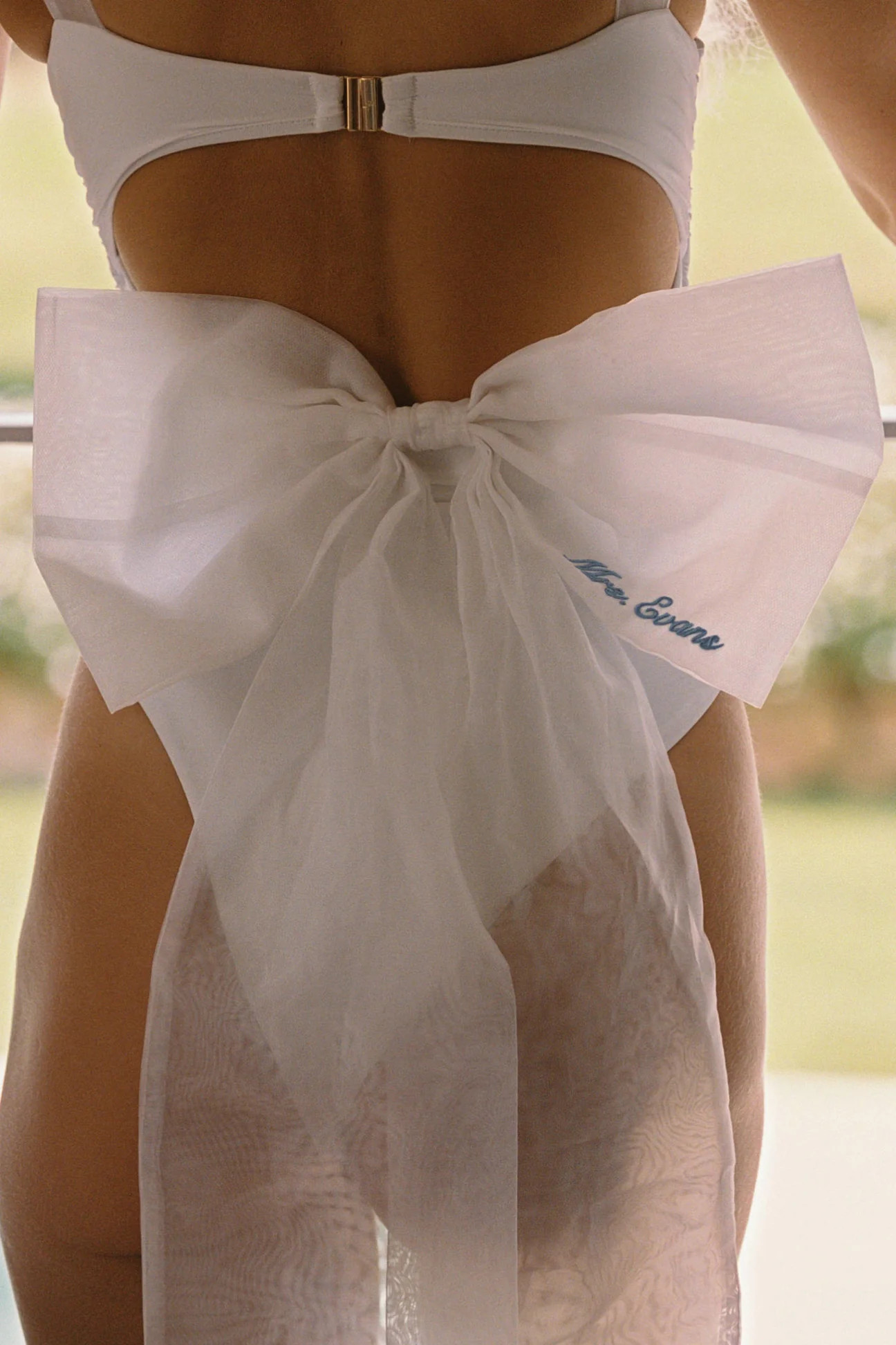 Solea White Ruched Bridal One Piece Swimsuit - Tulle Bow Detail | ALT SWIM