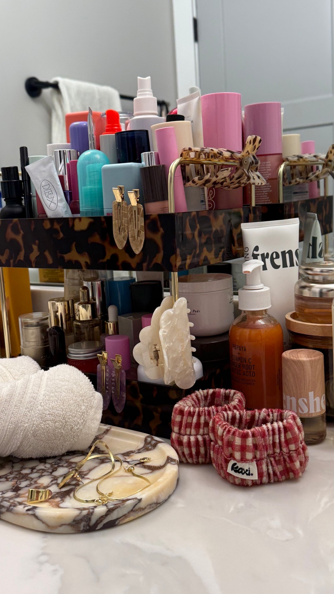 Girlhood in a pic 🪞✨💋 vanity and beauty products set up — love this marble tray for spa folded washcloths! 

Calacatta bathroom counter skincare beauty get ready with me grwm morning routine evening routine perfume hand lotion serum moisturizer Sephora ulta target tutorial winter trends popular top shared inspo home decor 

#LTKHome #LTKU #LTKBeauty