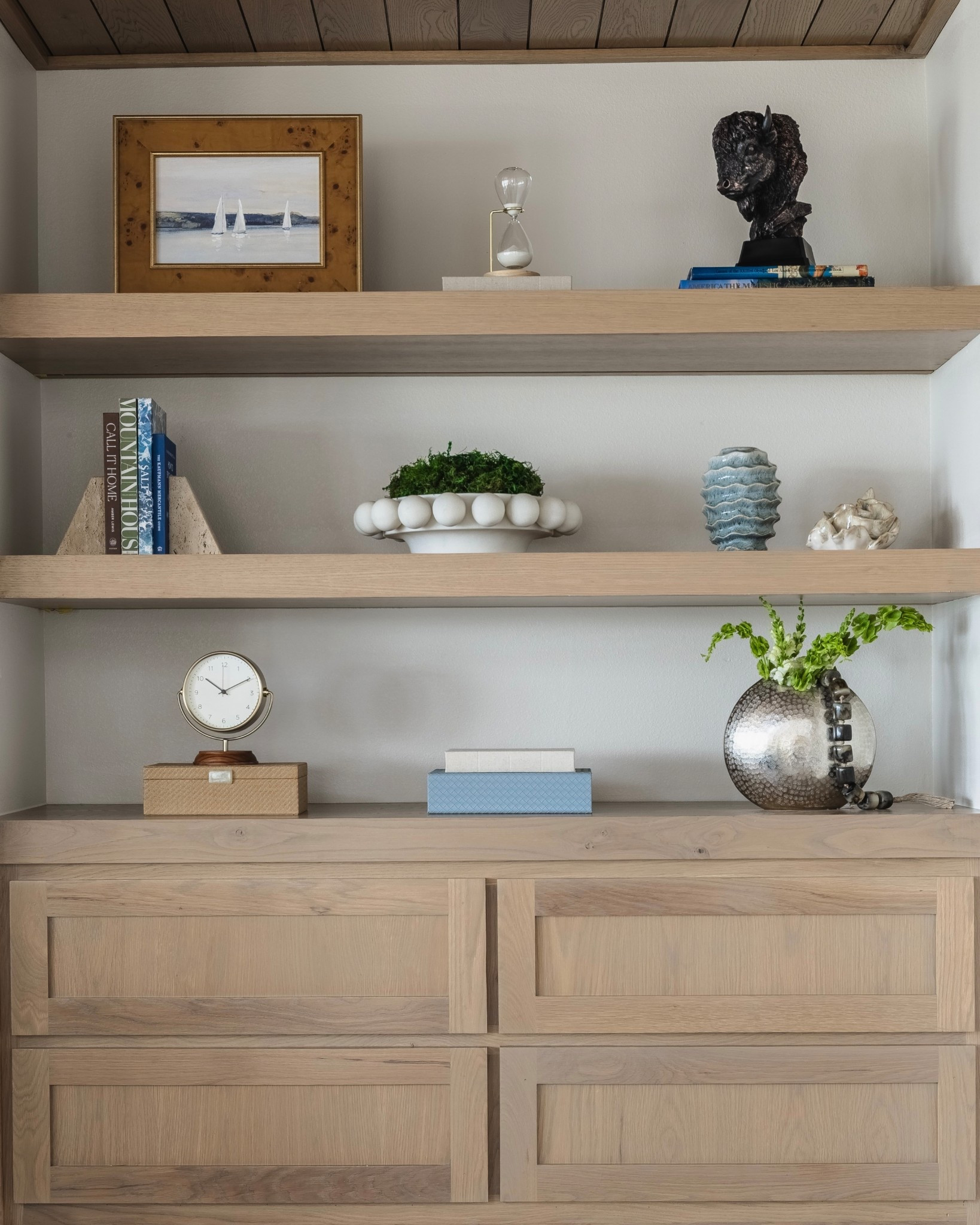 Shelves feeling a little…meh? Give them a coastal reset ✨ —style in 2s or 3s, stack some pretty books for height + a pop of color, then add a touch of greenery for that breezy, lived-in feel 🌿

#LTKHome #LTKMothersDay #LTKSeasonal