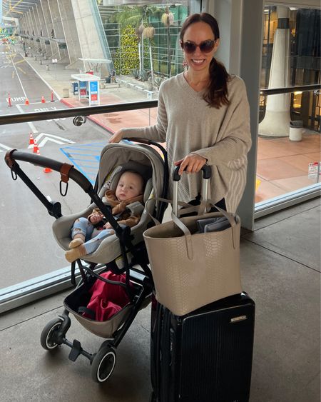 My mom travel bags: roomy tote + spinner carry-on + lightest car seat on the lightest travel stroller 

#LTKtravel